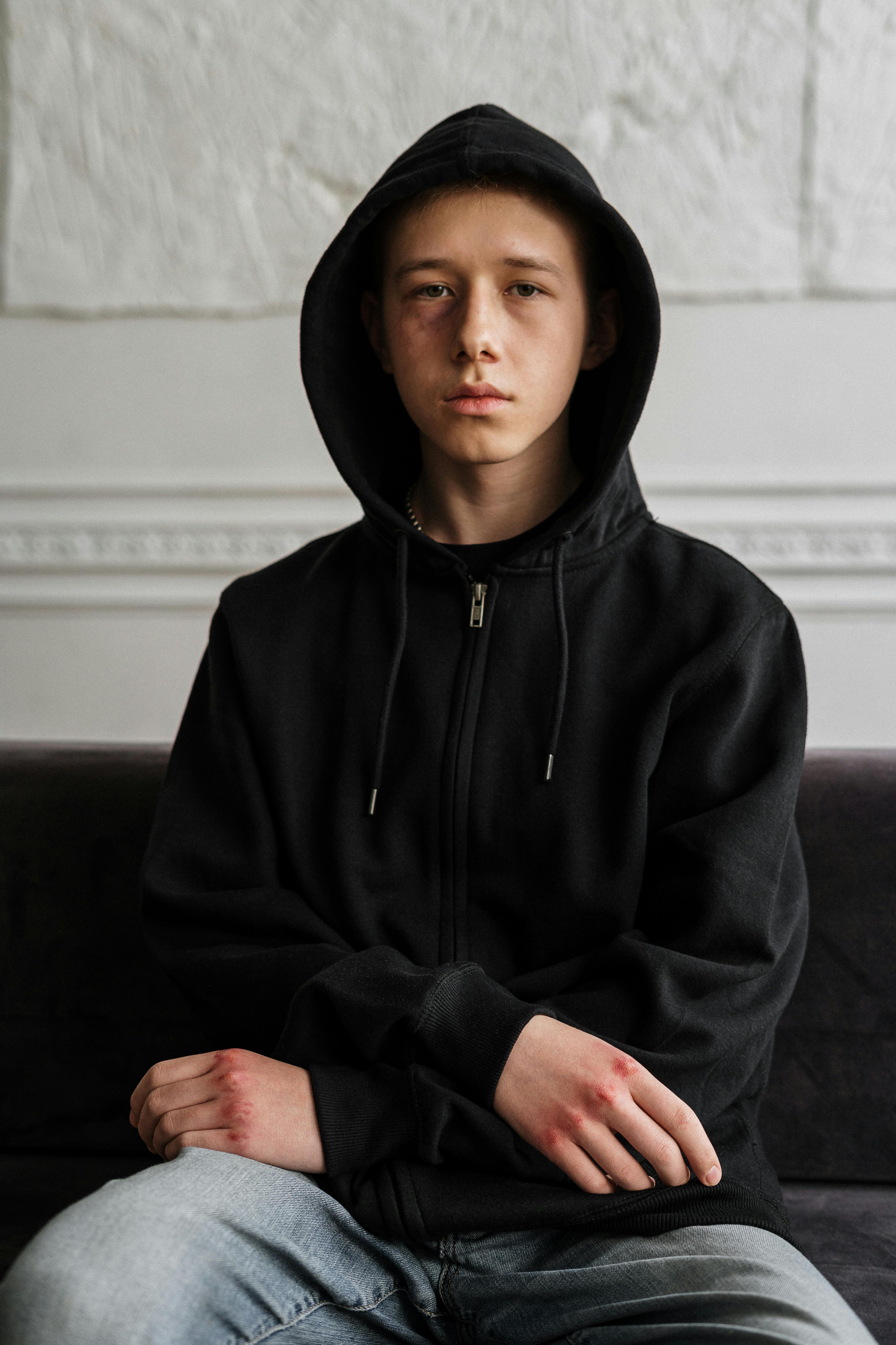 A sad teenage boy | Source: Pexels