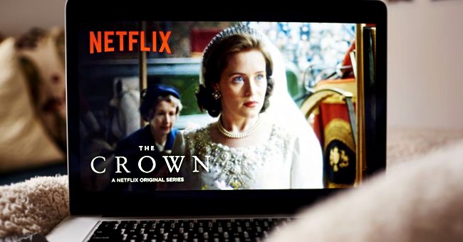 An image of "The Crown" playing on a laptop. | Photo: Getty Images