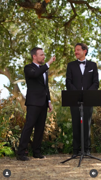 Daniel Durant signing on his wedding day, as he stands next to David Kurs. | Source: Instagram/lightcannonfilms