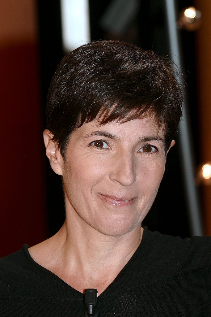Aurelie Filippetti confers an Honorary of Officier de lOrdre des Arts et des Lettres to Christine Angot at Ministere de la Culture on June 19, 2013 in Paris, France. | Photo : Getty Images Aurelie Filippetti confers an Honorary of Officier de lOrdre des Arts et des Lettres to Christine Angot at Ministere de la Culture on June 19, 2013 in Paris, France. | Photo : Getty Images