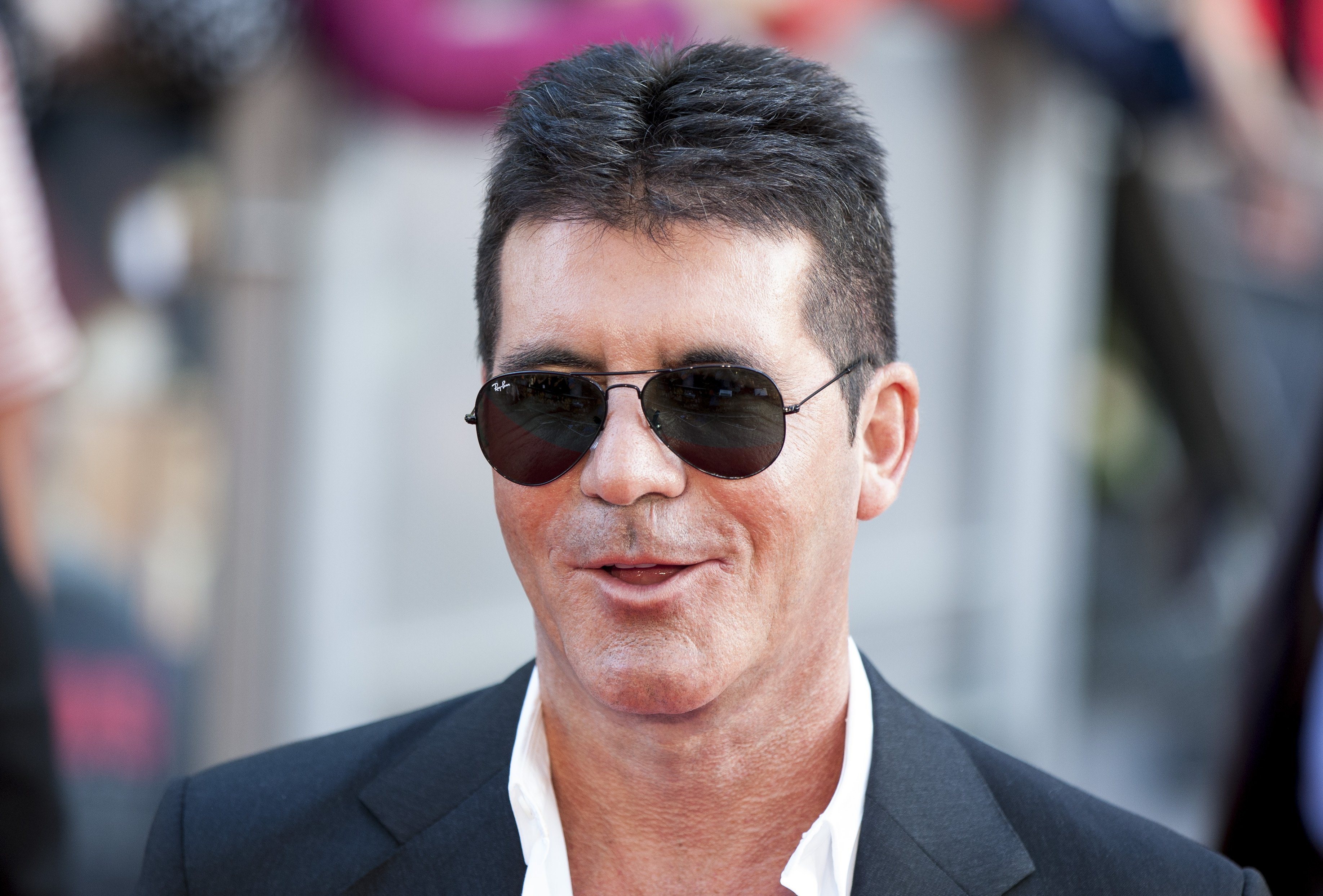 Simon Cowell at the premiere of "One Direction: This Is Us" in London, England on August 20, 2013 | Photo: Getty Images