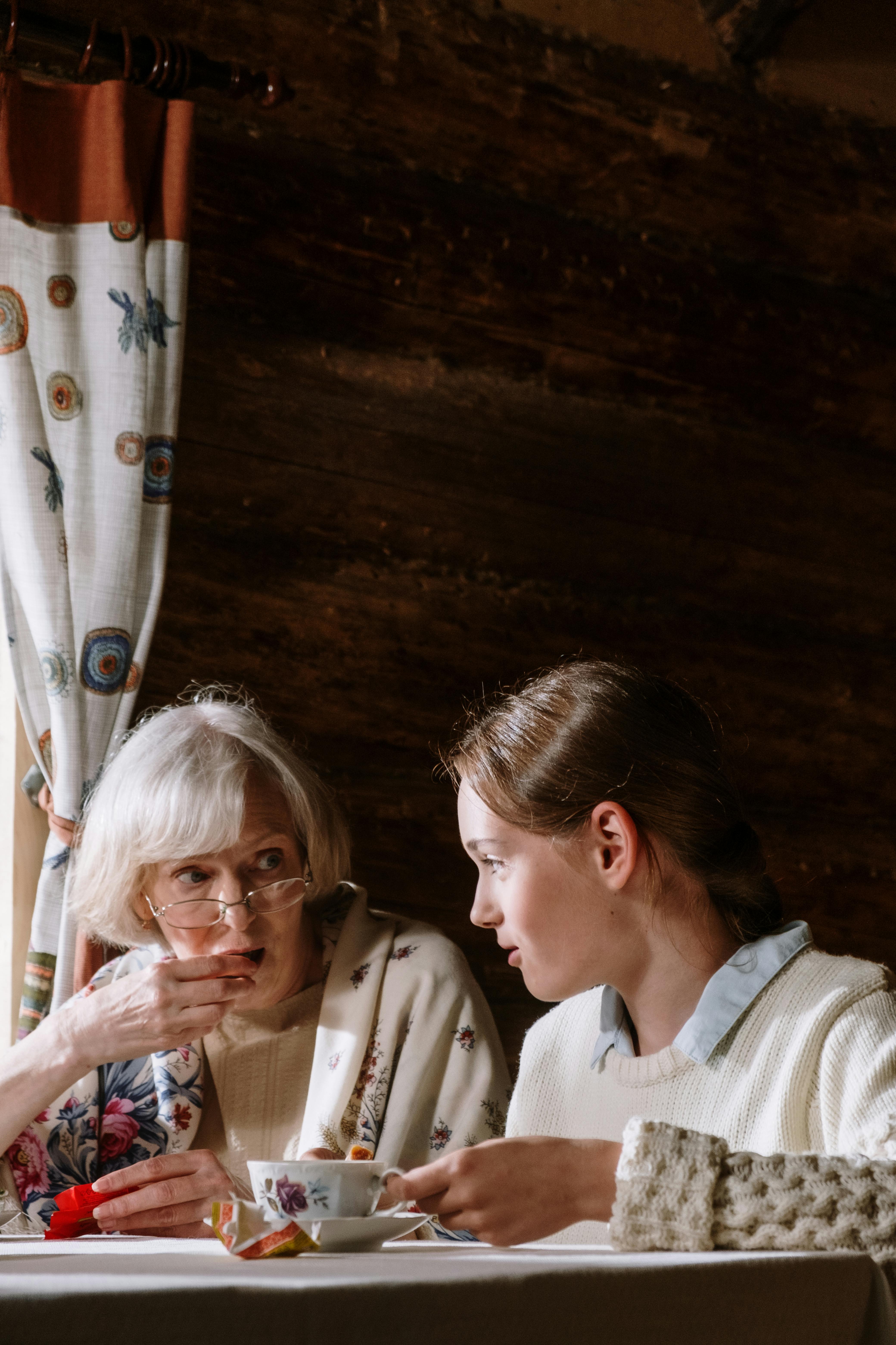 A senior woman and a younger woman talking seriously | Source: Pexels