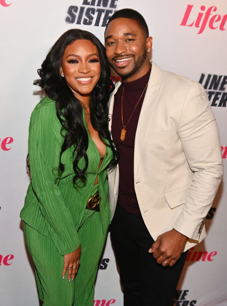 Drew Sidora and Ralph Pittman during the Atlanta screening of Lifetime's "Line Sisters" at IPIC Theaters at Colony Square on February 10, 2022, in Atlanta, Georgia. | Source: Getty Images