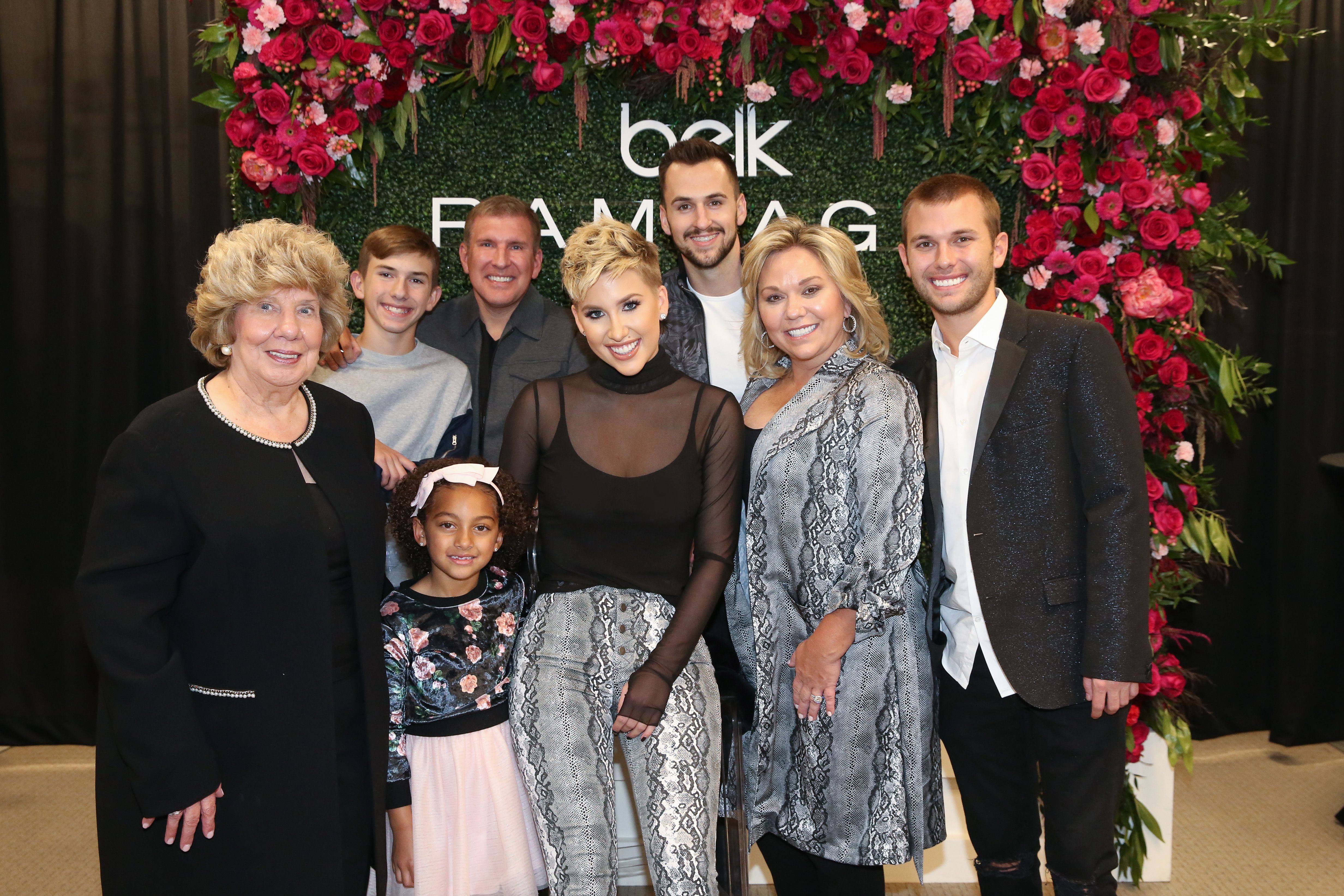 (Front) Faye, Chloe, Savannah, Julie, Chase Chrisley (Back row) Grayson and Todd Chrisley, and Nic Kerdiles at Savannah's appearance on November 05, 2019, in Franklin, Tennessee | Photo: Terry Wyatt/Getty Images 