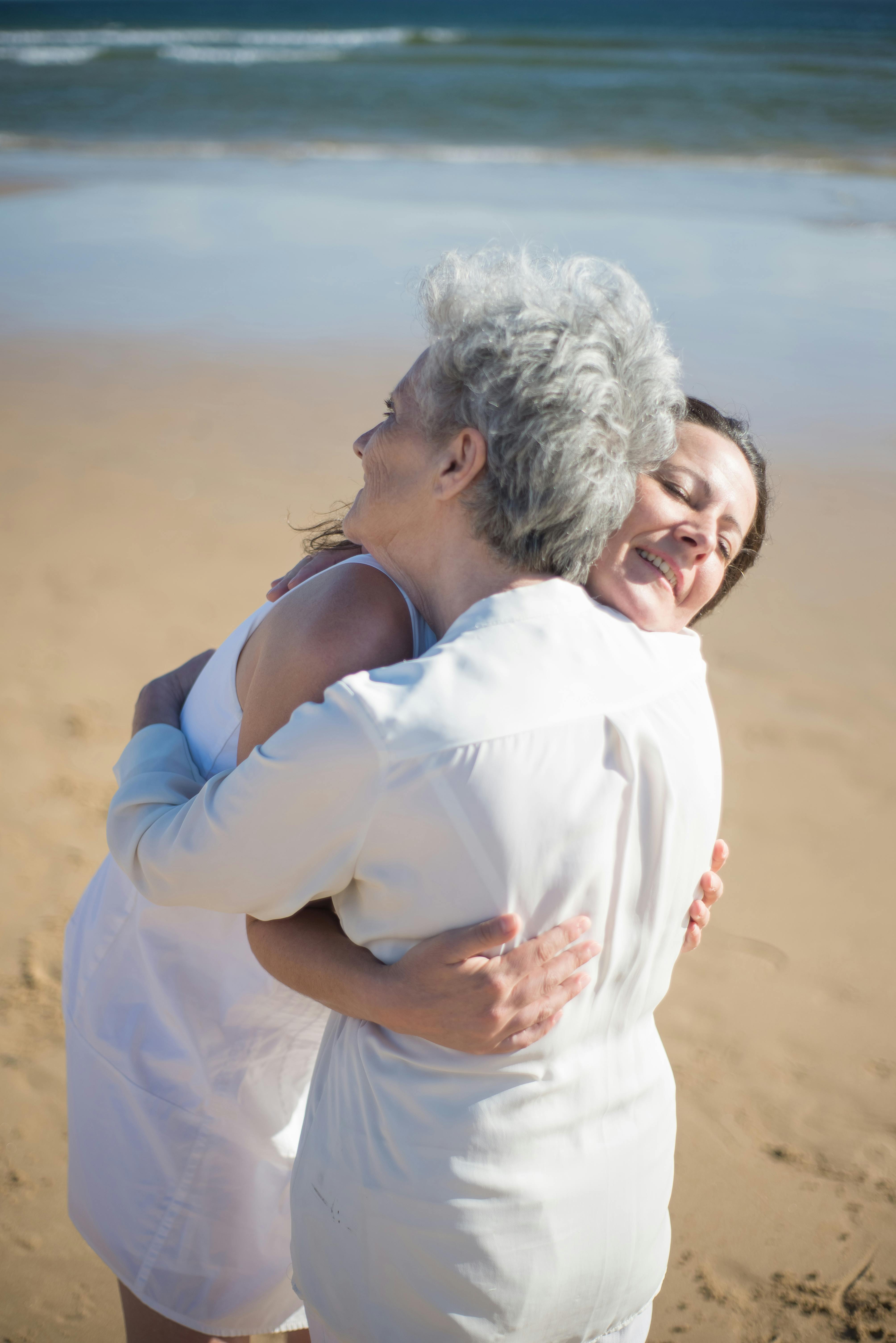 An older woman hugging a younger one | Source: Pexels