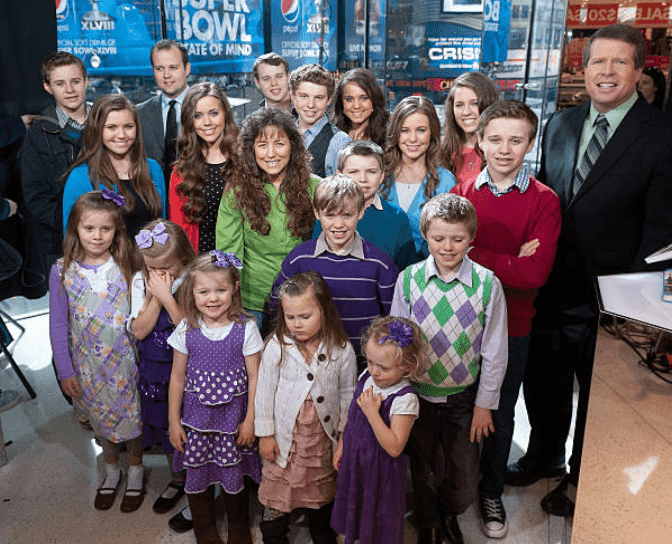 The Duggar family gather for an interview "Extra" at H&M in Times Square, on March 11, 2014 in New York City |Source: D Dipasupil/Getty Images for Extra
