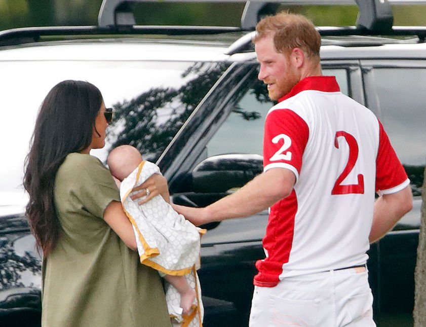 Meghan, Duchess of Sussex, Archie Harrison Mountbatten-Windsor and Prince Harry, Duke of Sussex attend the King Power Royal Charity Polo Match in Wokingham, England | Photo: Getty Images