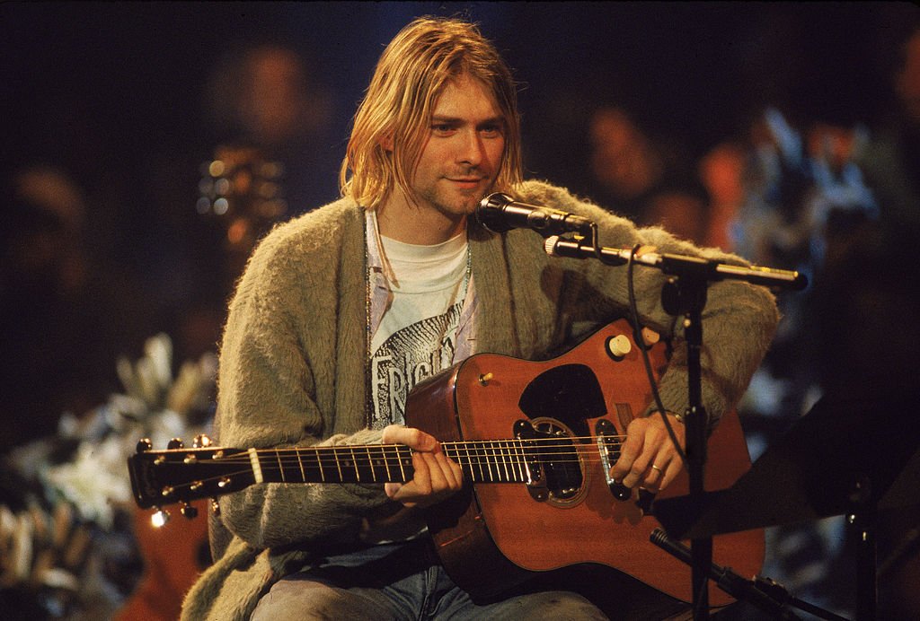 American singer and guitarist Kurt Cobain (1967 - 1994), performs with his group Nirvana at a taping of the television program 'MTV Unplugged,' New York, New York, Novemeber 18, 1993 | Photo: Getty Images