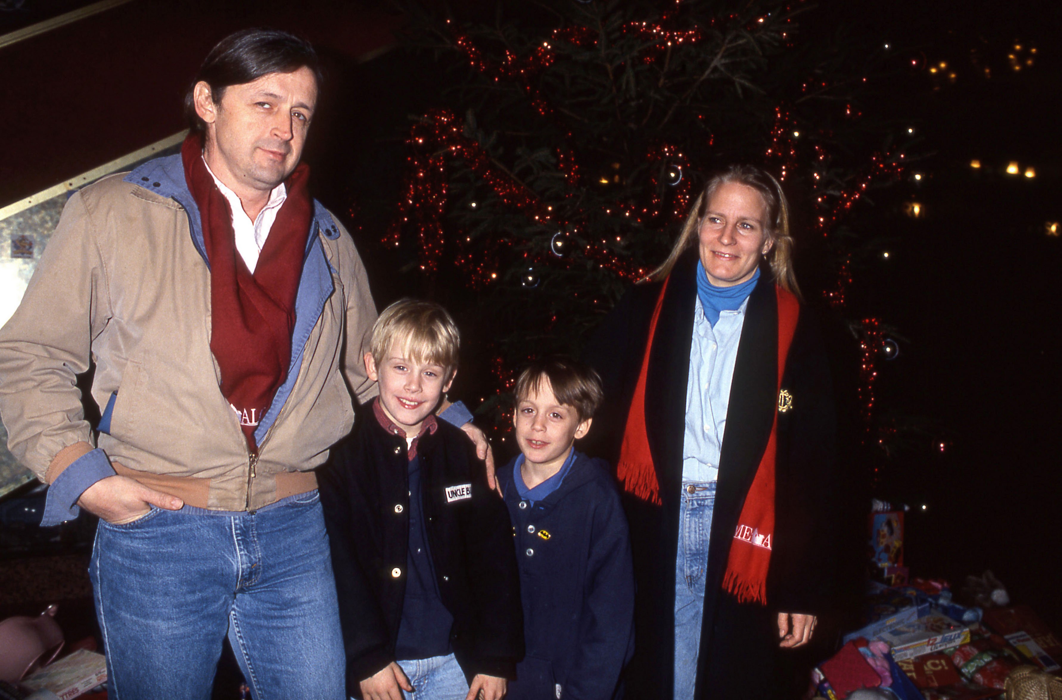 Macaulay Culkin with his mother, Patricia Brentrup, his father Christopher Kit Culkin, and brother Kieran on December 11, 1990 in Paris, France | Getty Images