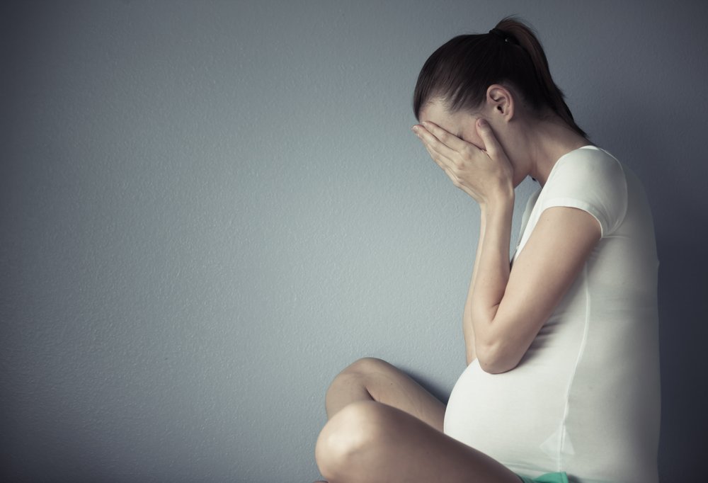 Pregnant sad girl | Photo: Shutterstock
