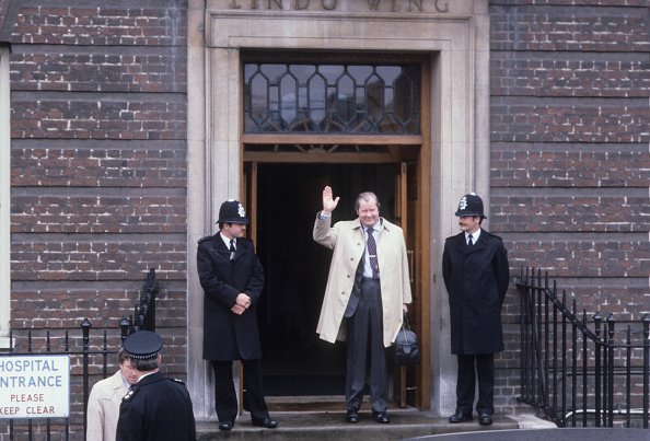 Johnnie Spencer, 8th Earl Spencer, father of Princess Diana, leaves St Mary's Hospital after visiting his newborn grandson, William Arthur Philip Louis | Photo: Getty Images