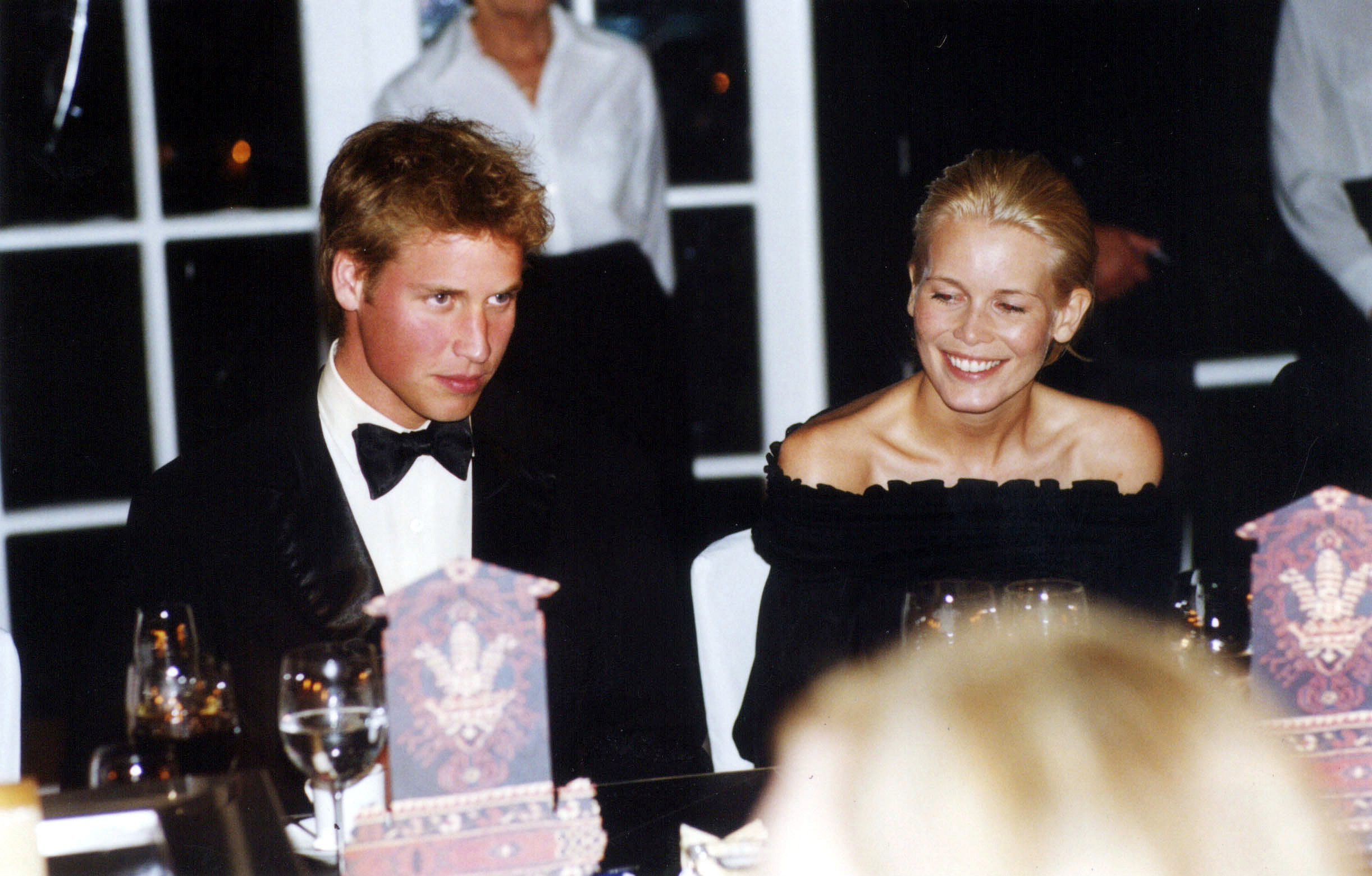 A then-teenage Prince William appeared slightly flushed but composed as he sat beside Claudia Schiffer during a formal dinner at Highgrove in Gloucestershire on August 3, 2001. The evening brought them together once again, years after their memorable first meeting arranged by Princess Diana.