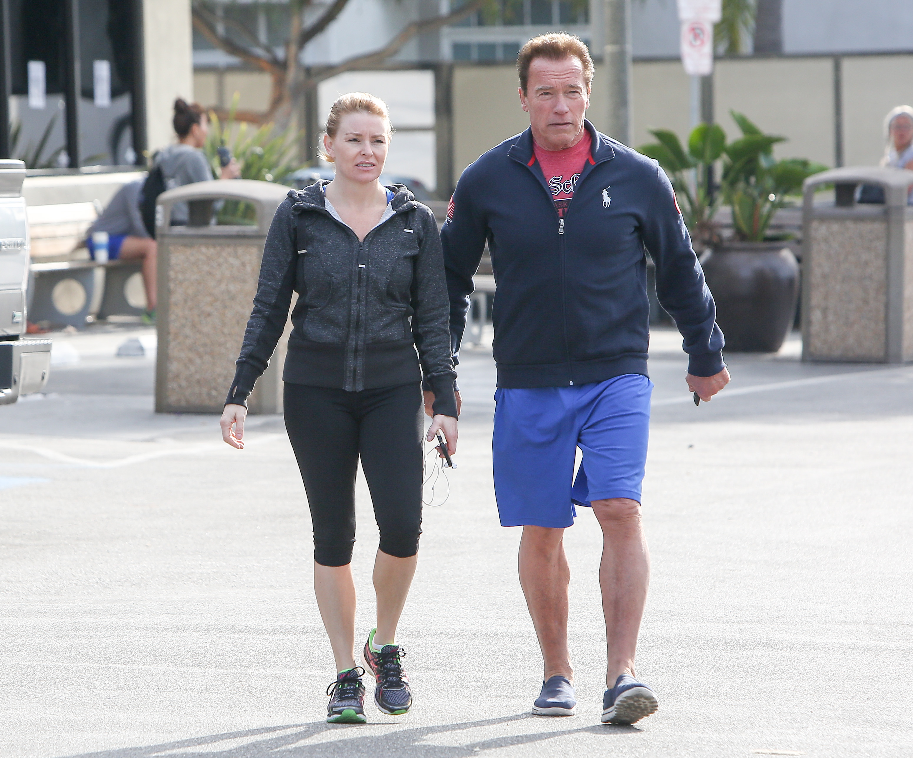 Arnold Schwarzenegger and Heather Milligan are seen on December 14, 2014 in Los Angeles, California | Source: Getty Images