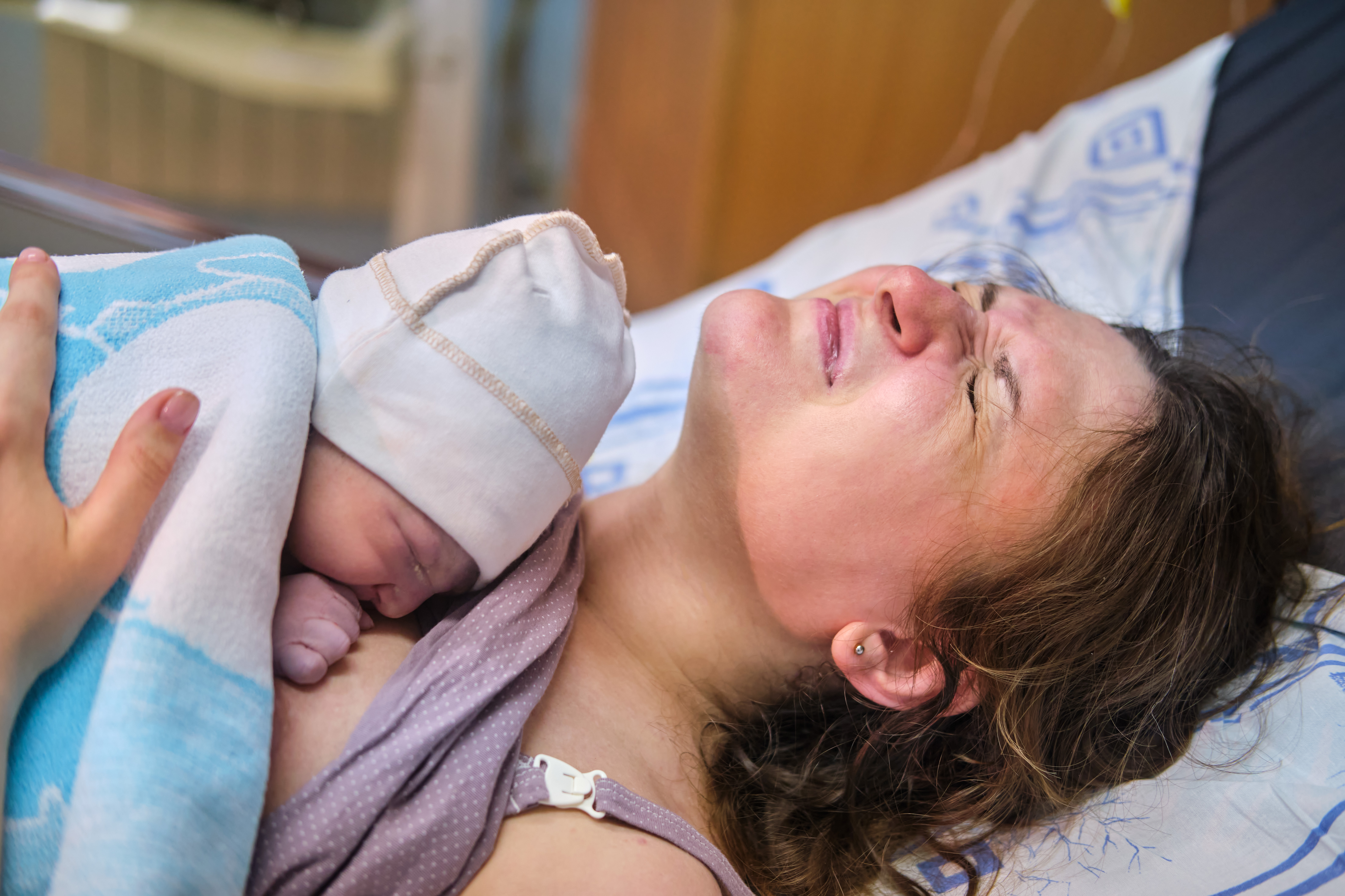 A woman who gave birth to a newborn baby | Source: Shutterstock.com