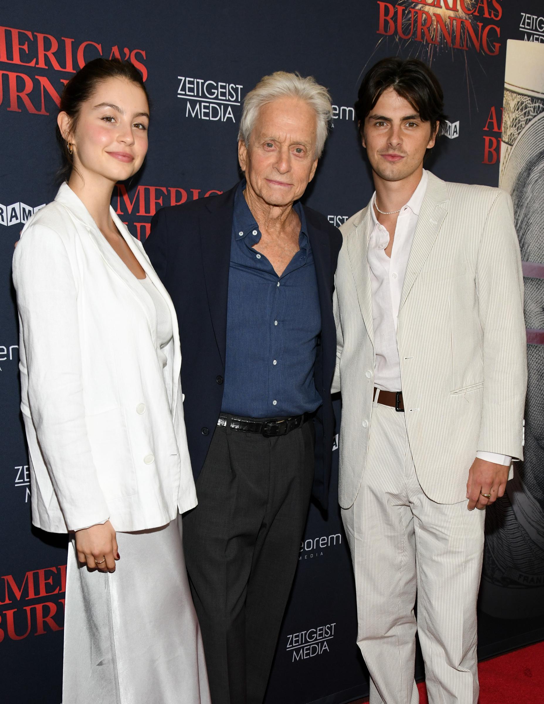 Carys Douglas, Michael Douglas and Dylan Douglas at the "America's Burning" premiere held at the DGA New York Theater on July 10, 2024 in New York City | Source: Getty Images