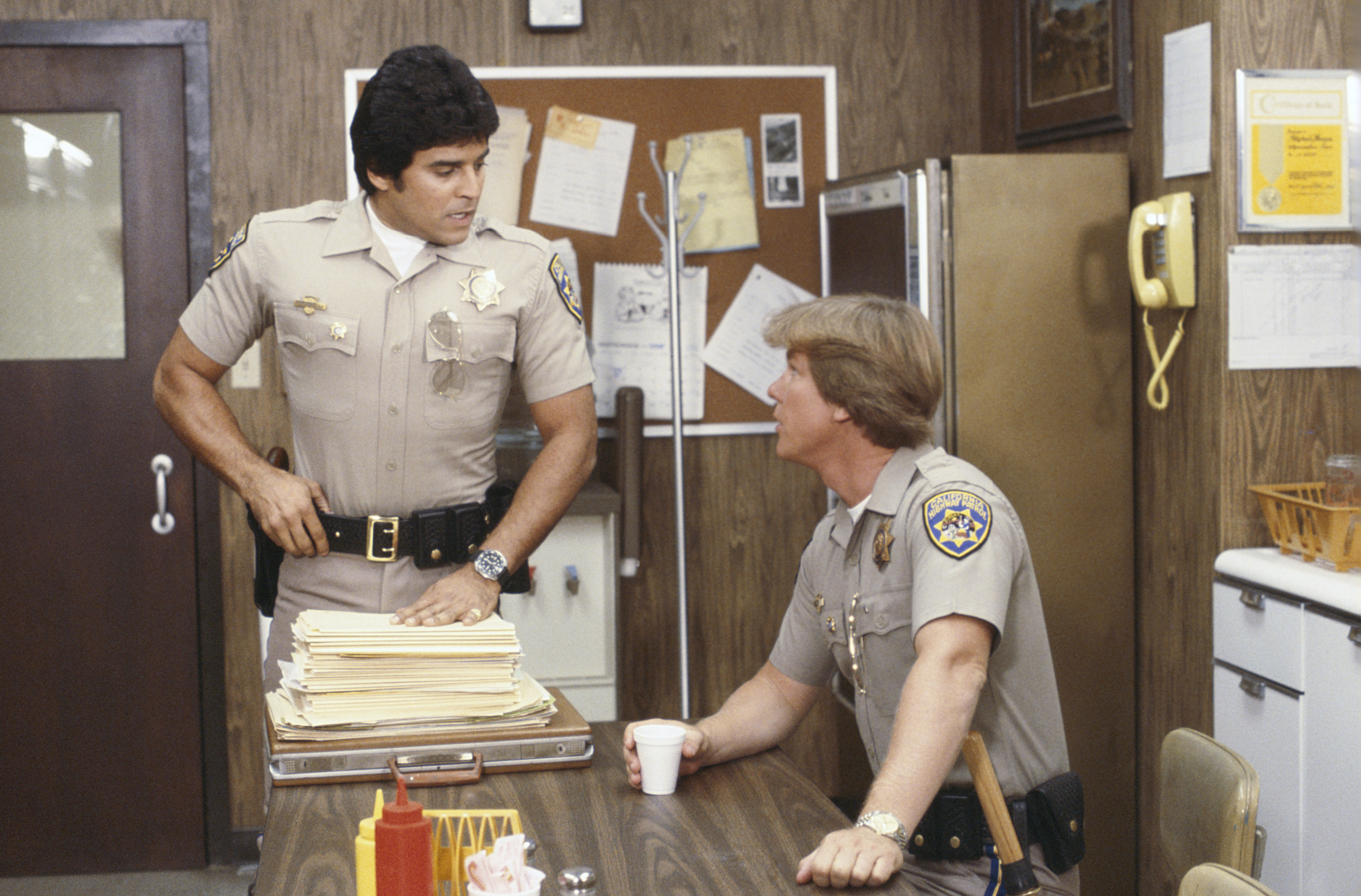 The actor engages in a scene with a co-star in the 1977 series "CHiPs." | Source: Getty Images