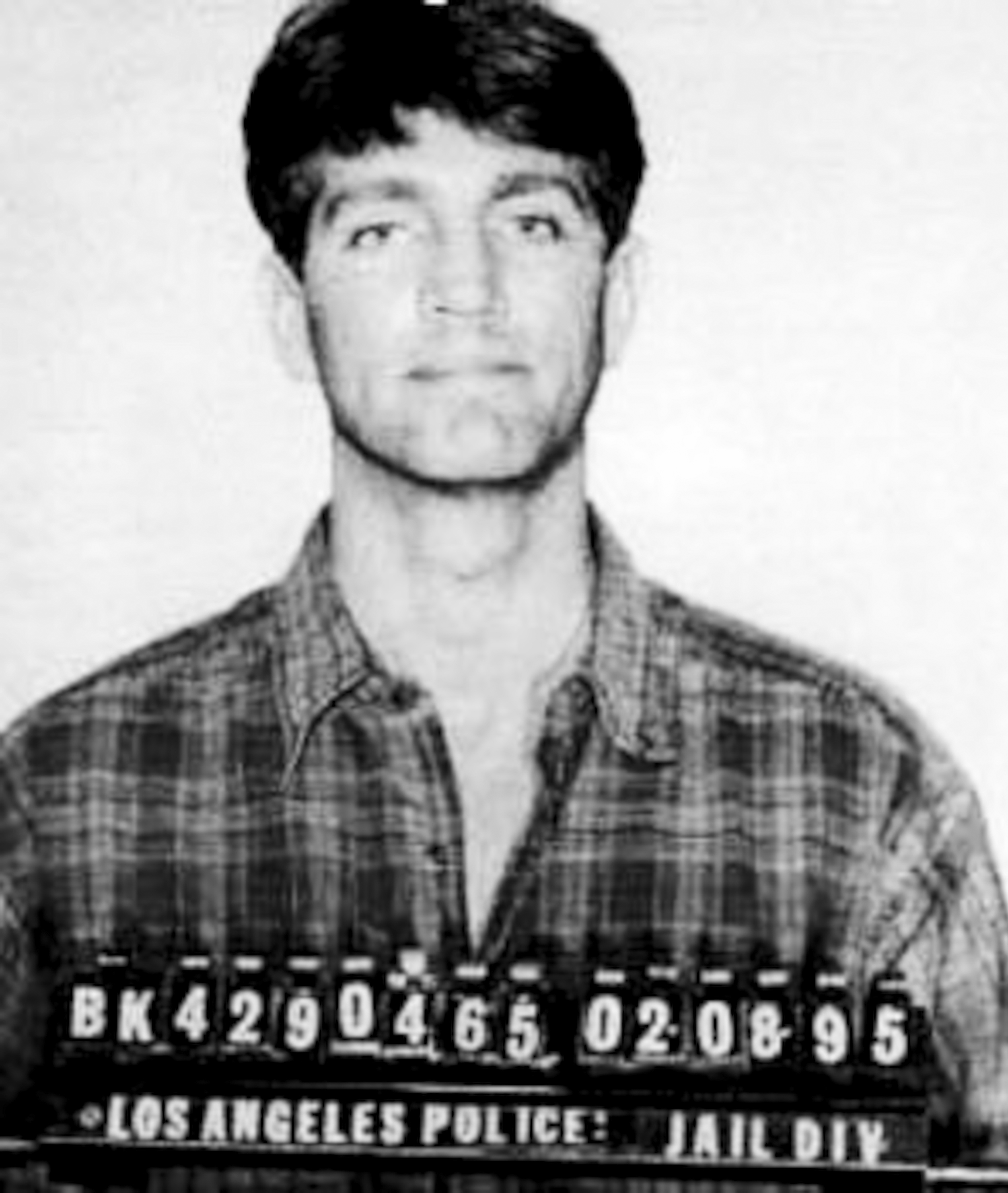Eric Roberts in a mug shot following his arrest in Los Angeles, on February 8, 1995 | Source: Getty Images