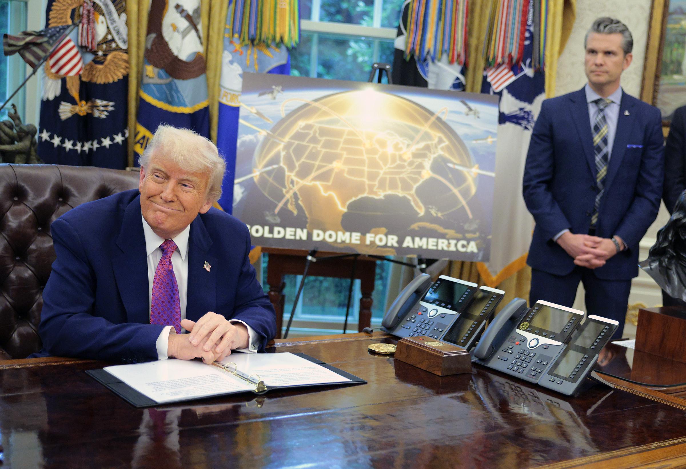 Donald Trump speaks alongside Secretary of Defense Pete Hegseth on May 20, 2025 | Source: Getty Images