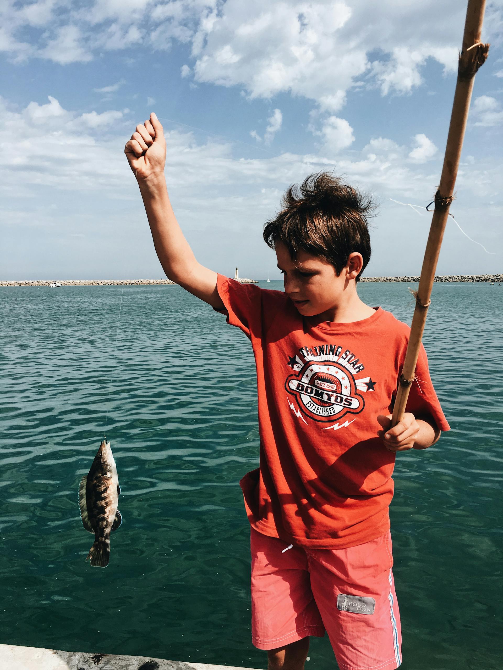 A boy fishing | Source: Pexels