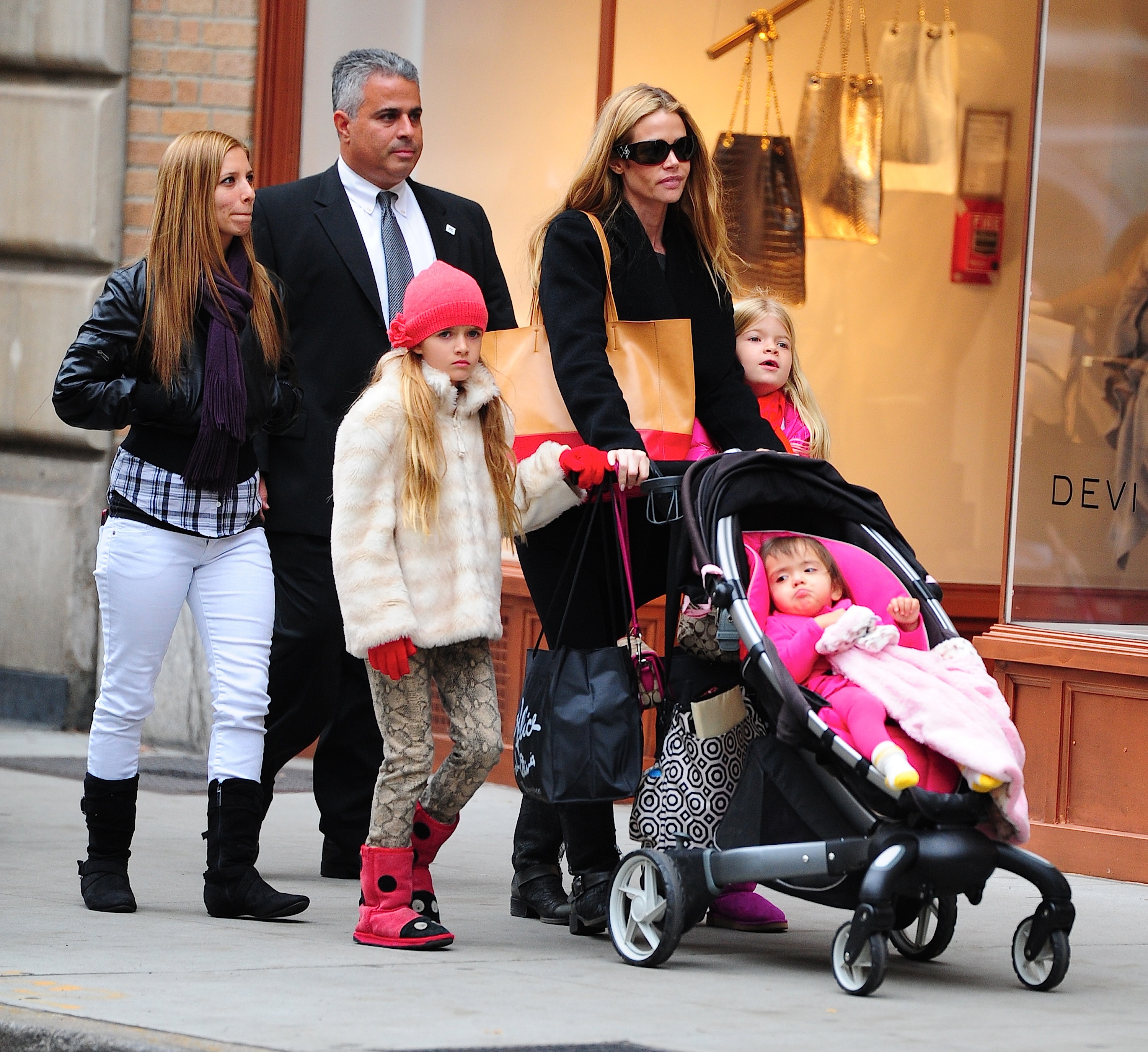 Denise Richards, Sam Sheen, Eloise Joni Richards and Lola Rose Sheen on Madison Avenue on November 1, 2012 in New York City | Source: Getty Images