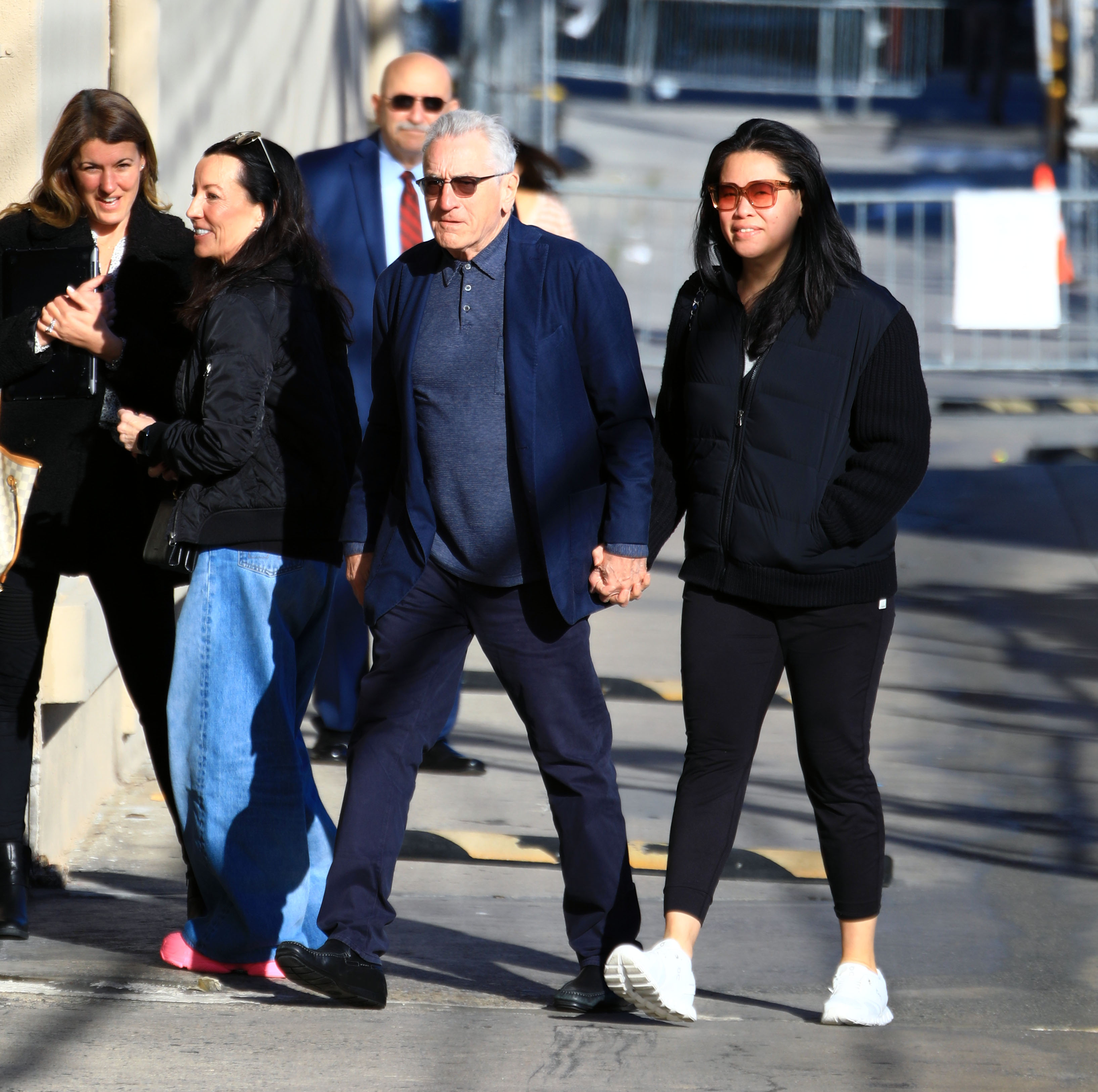 Robert De Niro and Tiffany Chen arriving at "Jimmy Kimmel Live!" on March 11, 2024 in Los Angeles, California | Source: Getty Images