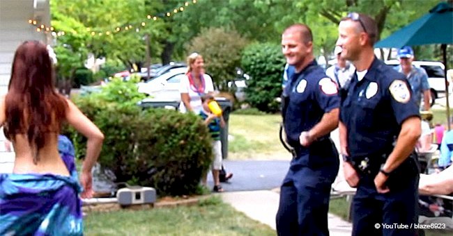 Police officers crash hula party for hysterical dance-off (video)