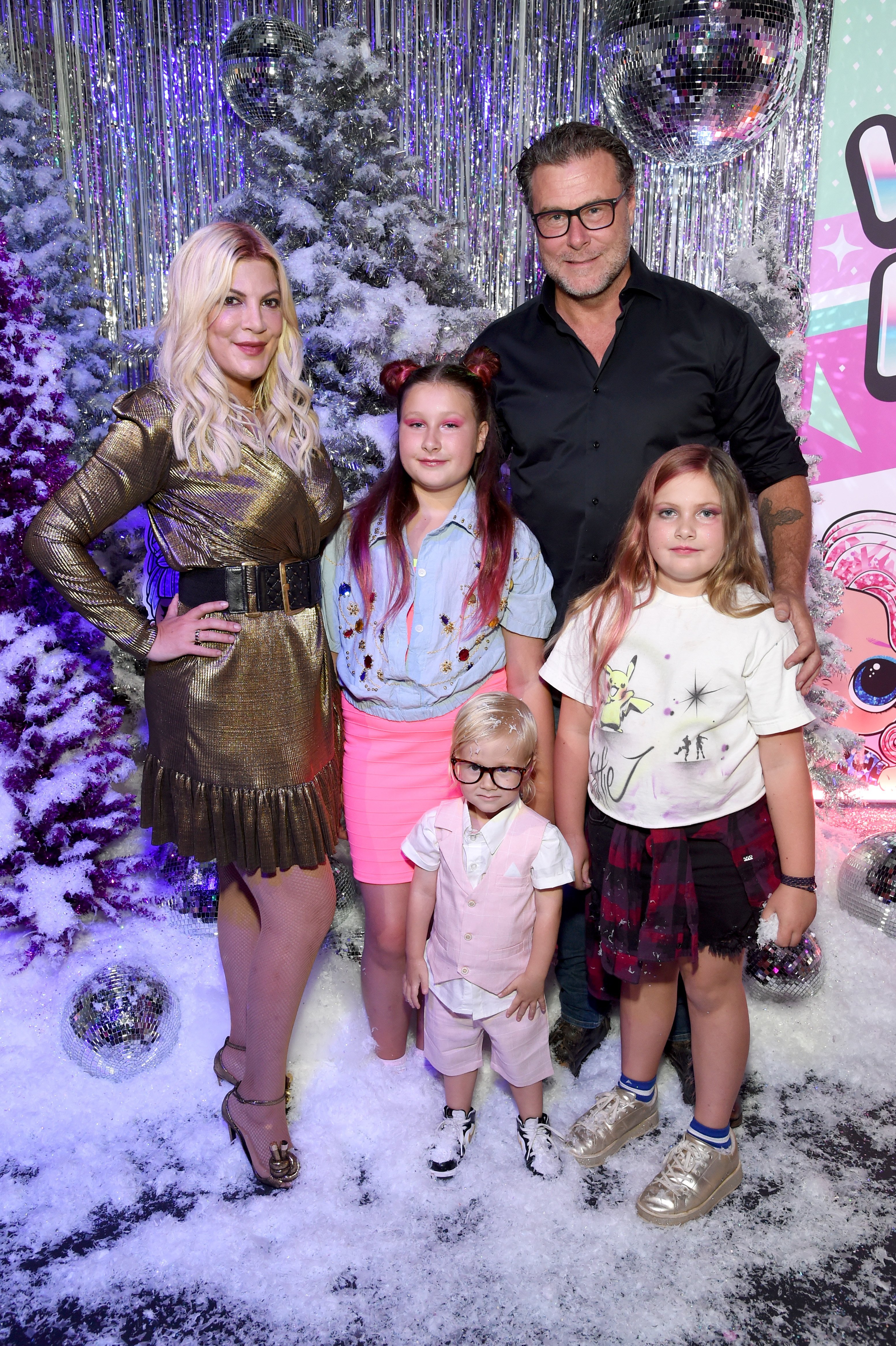 Tori Spelling and Dean McDermot with three of their kids attend L.O.L. Surprise! Winter Disco Launch Party in Los Angeles, California on September 27, 2019 | Photo: Getty Images