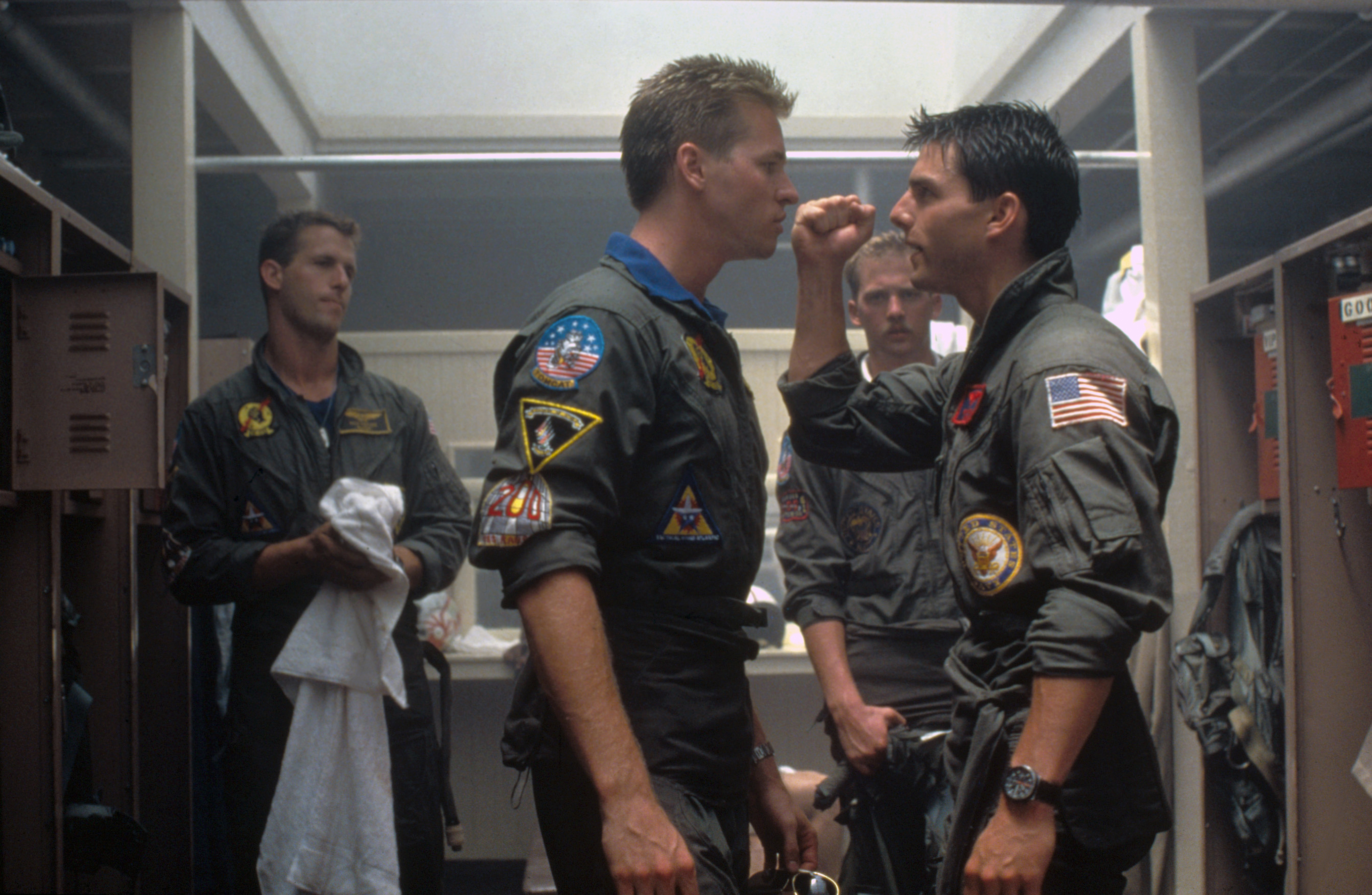 Val Kilmer and Tom Cruise on the set of "Top Gun," directed by Tony Scott, circa 1986. | Source: Getty Images