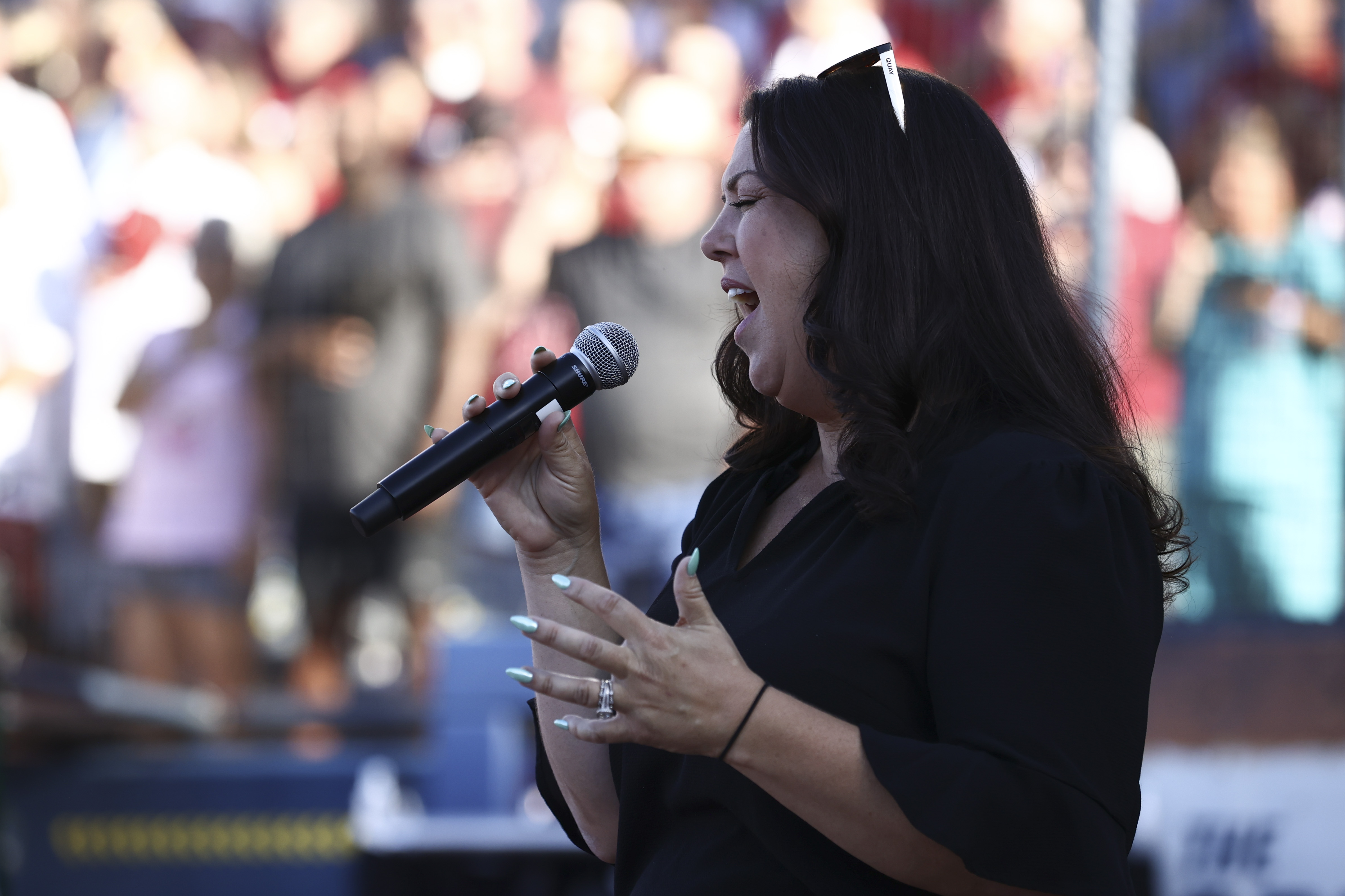 Krystal Keith performing during the NCAA Division I Softball Championship in Oklahoma City, Oklahoma on June 5, 2024 | Source: Getty Images