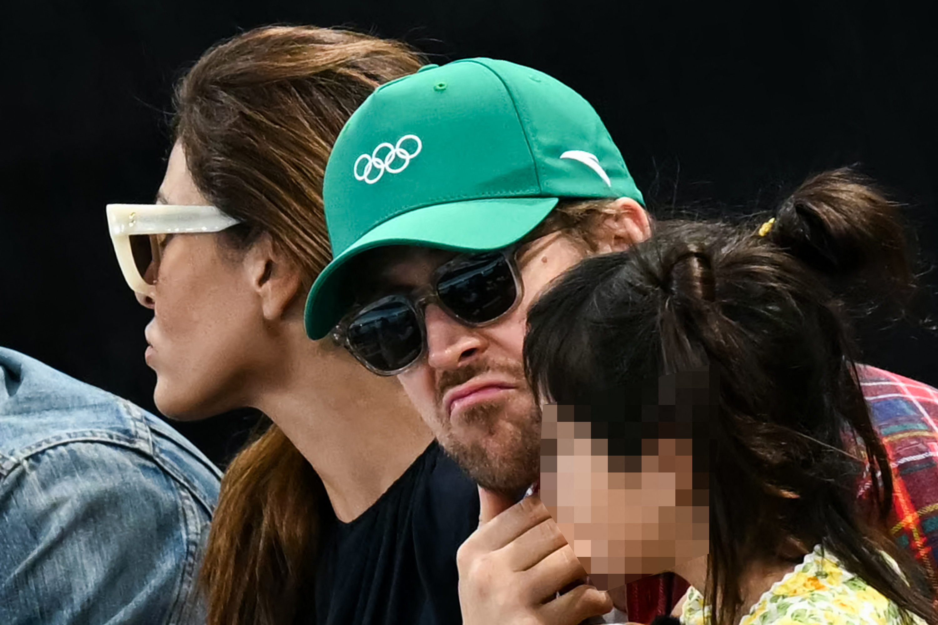 Eva Mendes and Ryan Gosling watching the women's uneven bars final at the Bercy Arena during the 2024 Paris Olympics on August 4, 2024 | Source: Getty Images