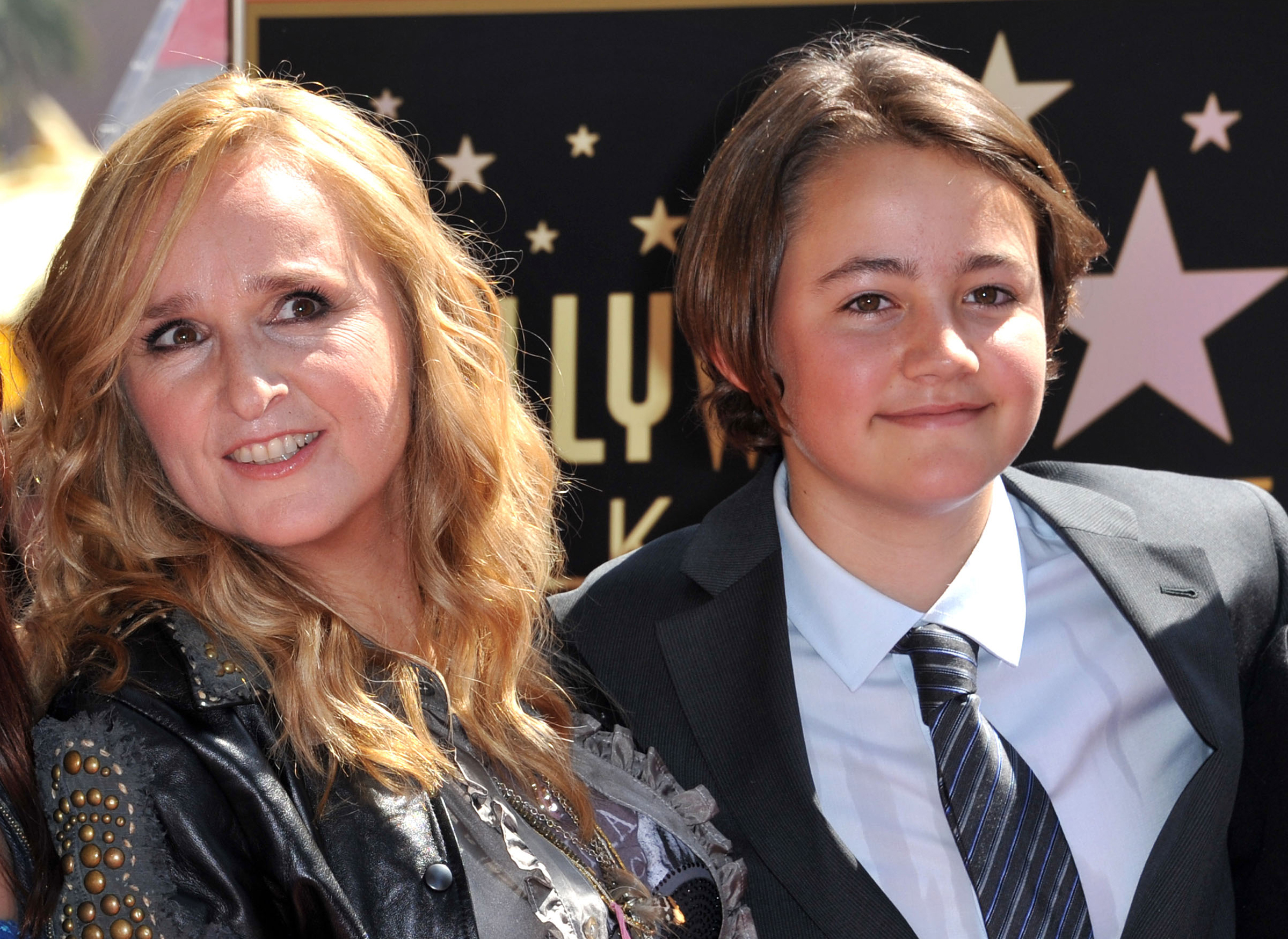 Melissa Etheridge and Beckett Cypher posing during her Walk of Fame ceremony held at the Hard Rock Cafe in Hollywood on September 27, 2011 | Source: Getty Images