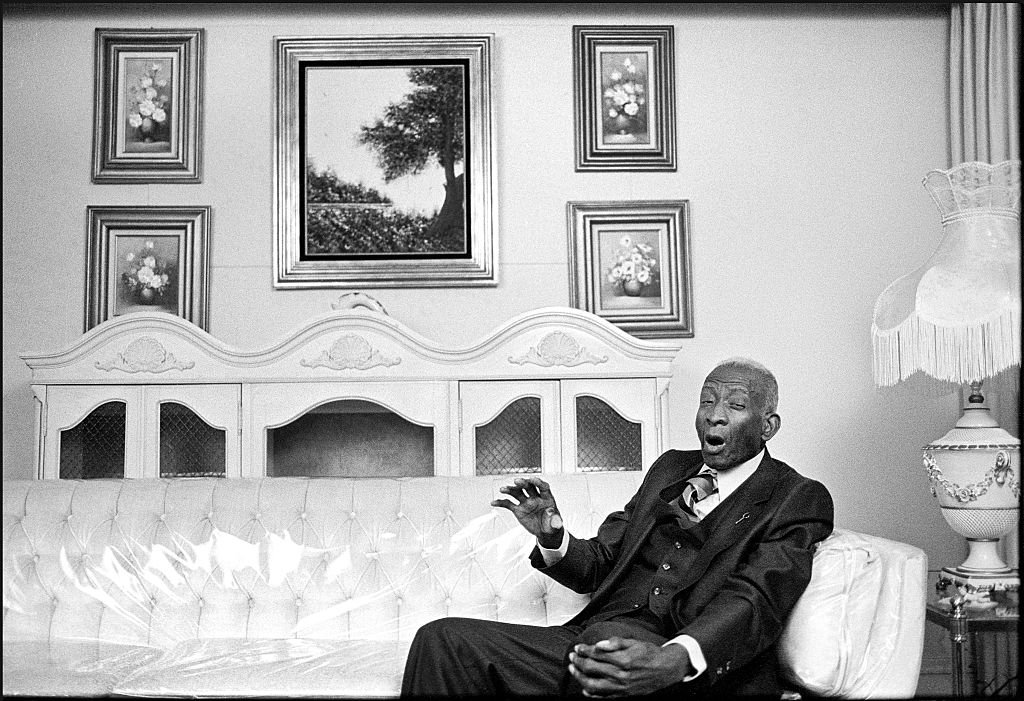 American Gospel musician Thomas A Dorsey singing in his living room in Chicago, Illinois in March 1983. | Photo: Getty Images
