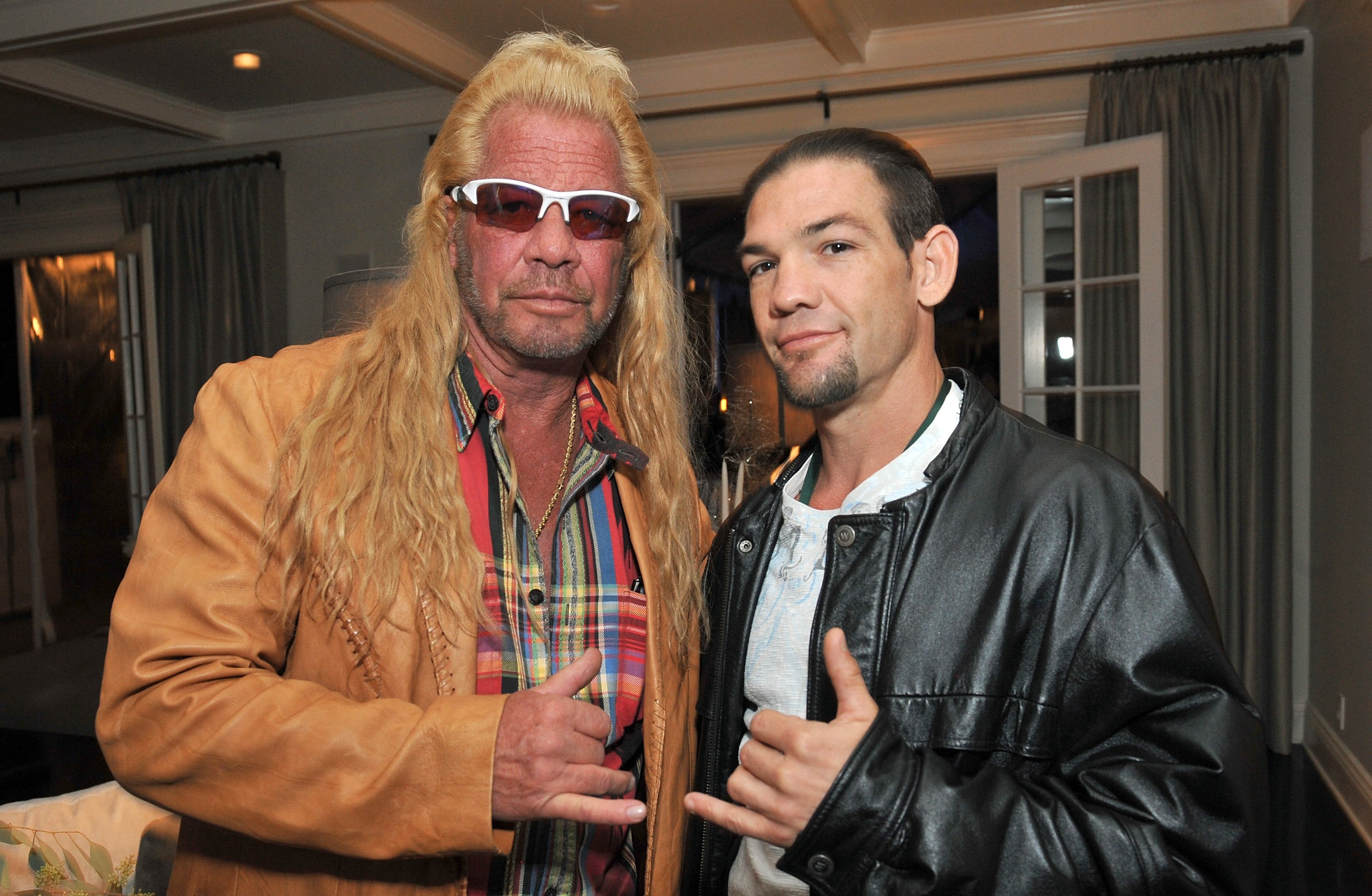 Dog Chapman and Leland Chapman attend the 2013 Electus & College Humor Holiday Party on December 12, 2013, in Los Angeles, California. | Source: Getty Images.