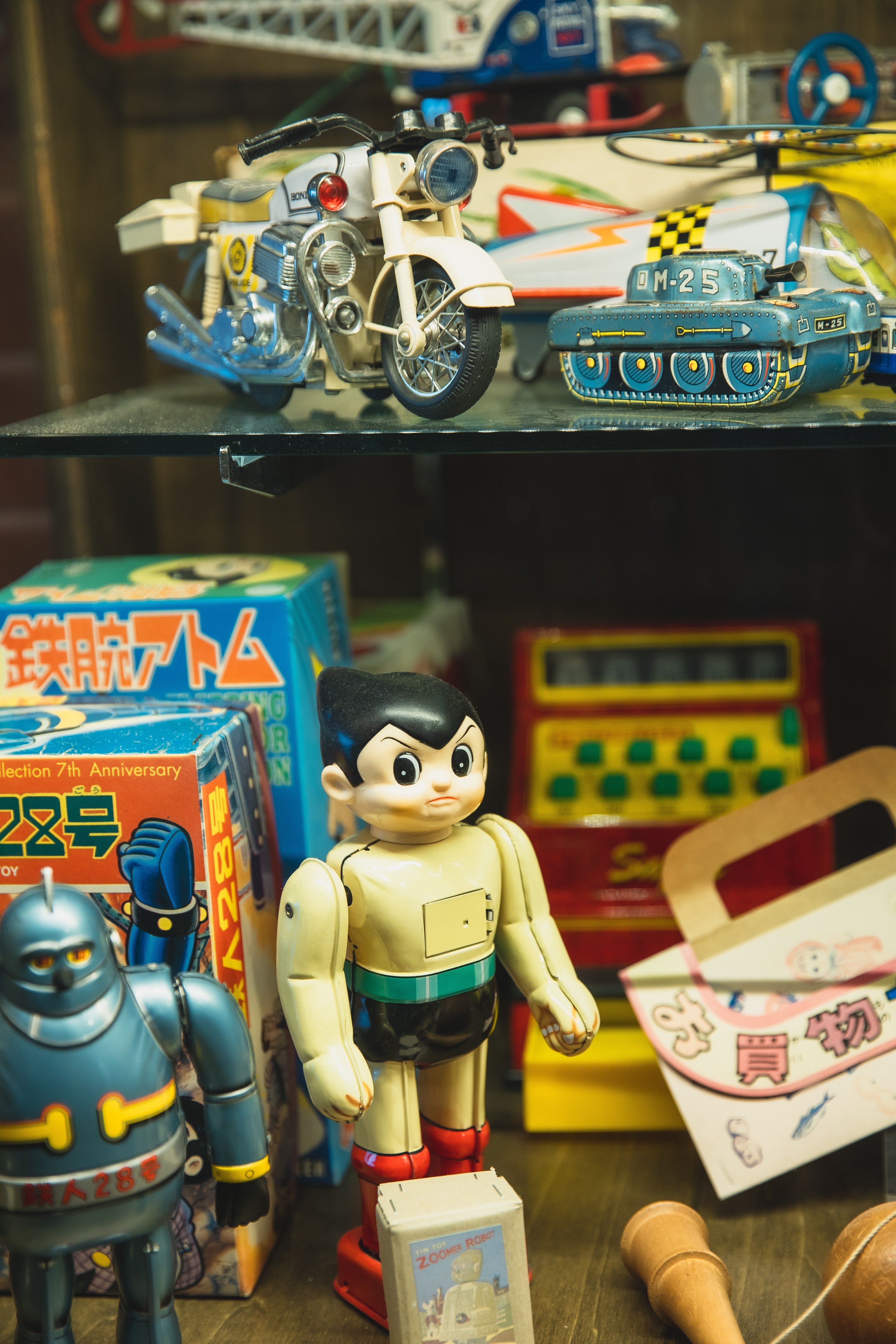 The man was selling used toys on the side of the road. | Source: Pexels