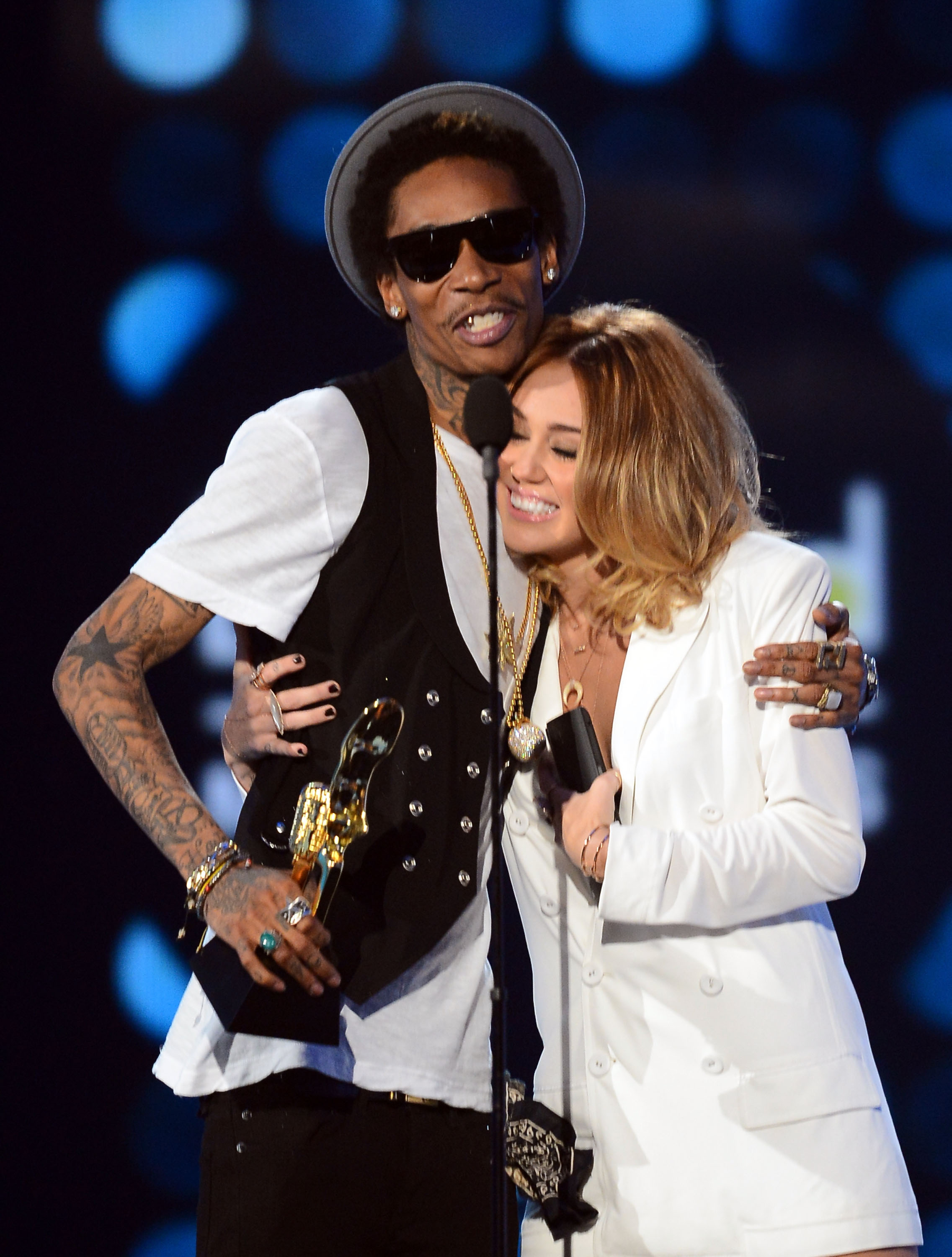 Wiz Khalifa and Miley Cyrus onstage during the 2012 Billboard Music Awards on May 20 in Las Vegas, Nevada. | Source: Getty Images