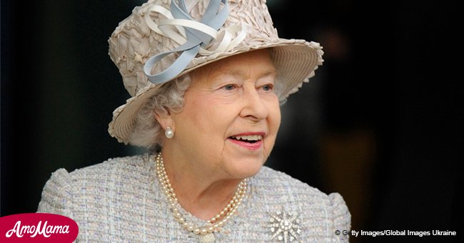 The Queen wore sunglasses and carried an umbrella to the Buckingham Palace party