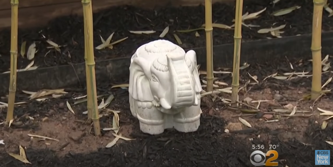 The ceramic elephant that sits where Matthew Emanuel and his wife, Maria Colonna-Emanuel, found a safe in their Todt Hill, Staten Island, yard on May 15, 2018 | Source: YouTube/CBS New York