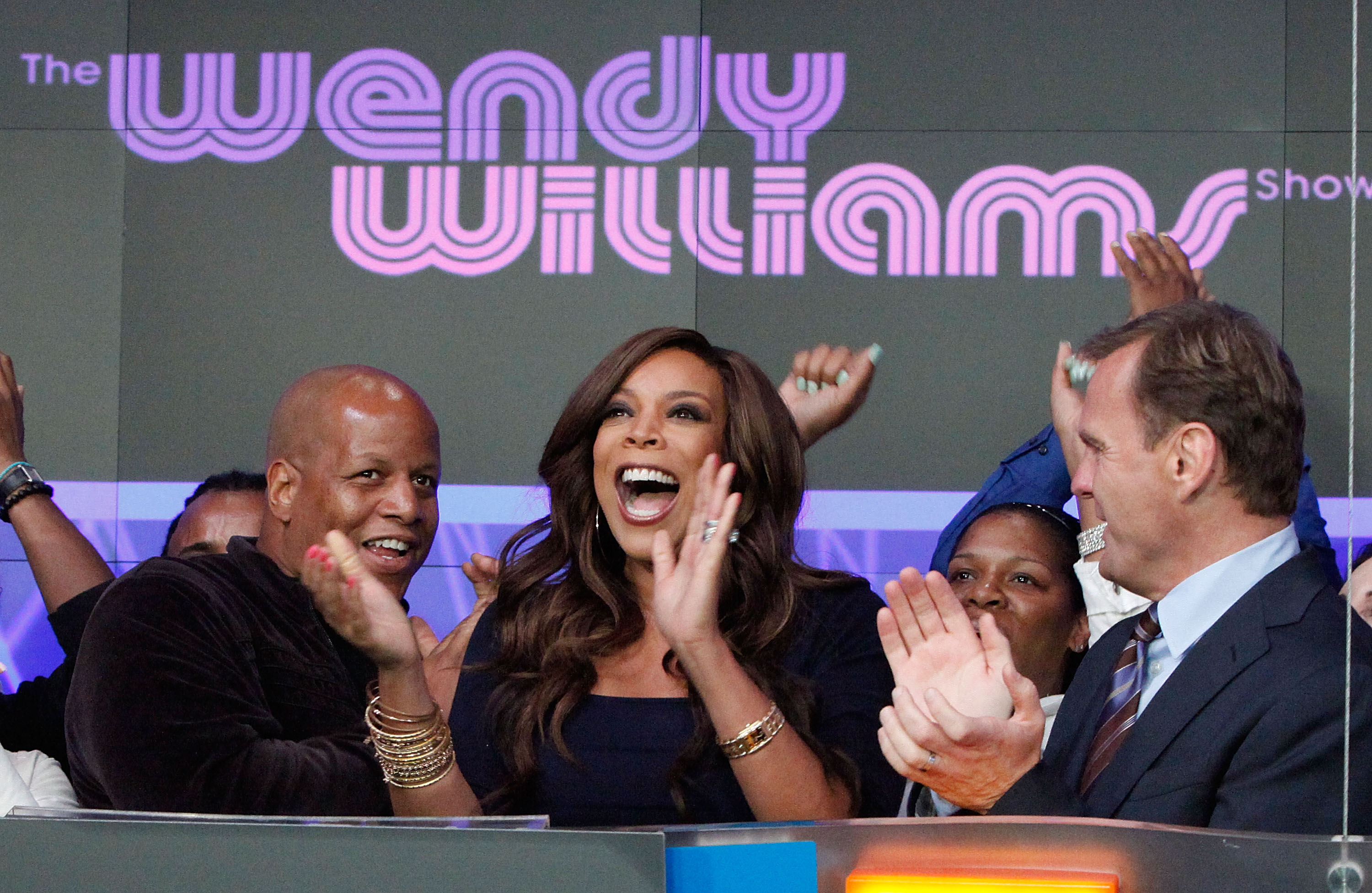 Kevin Hunter, Wendy Williams and Bruce Oust rings the opening bell on August 25, 2010 in New York City | Source: Getty Images