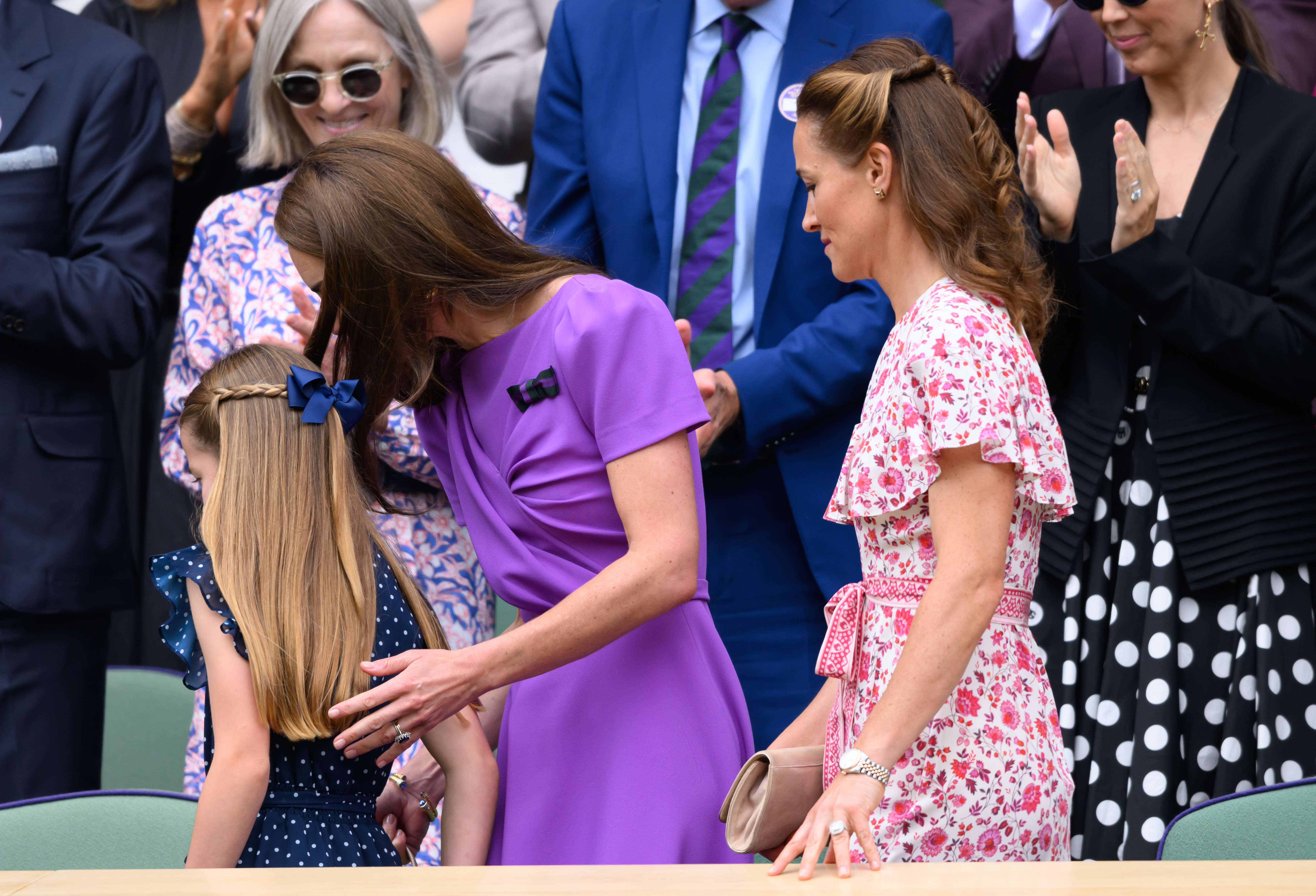 Princess Charlotte, Kate Middleton and Pippa Middleton court-side of Centre Court during the Wimbledon Tennis Championships on July 14, 2024, in London, England. | Source: Getty Images