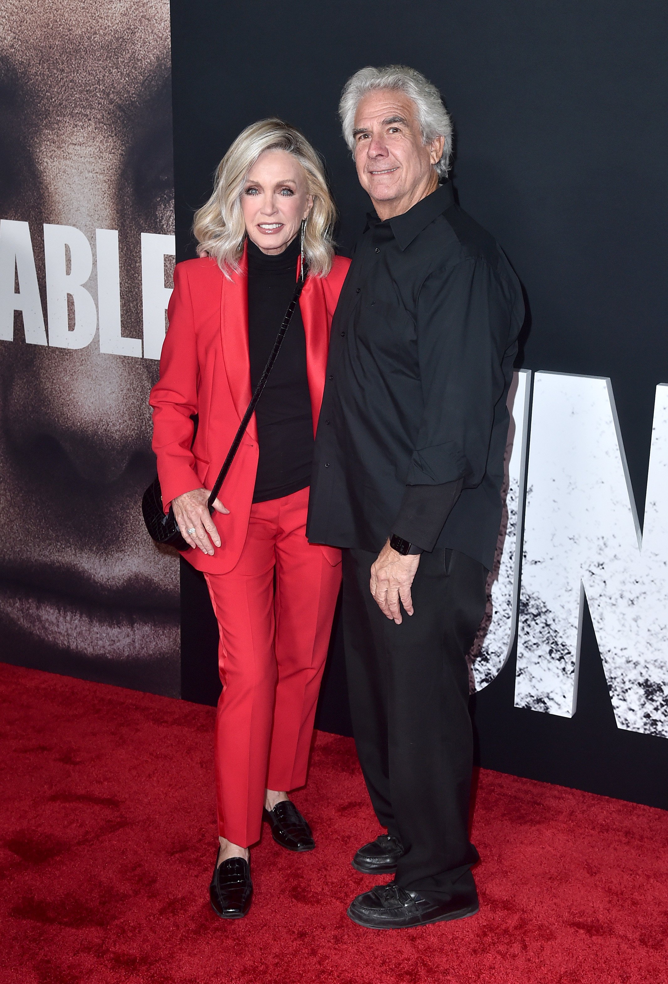 Donna Mills and Larry Gilman attend the Los Angeles premiere of Netflix's "The Unforgivable" at DGA Theater Complex on November 30, 2021 in Los Angeles, California | Source: Getty Images
