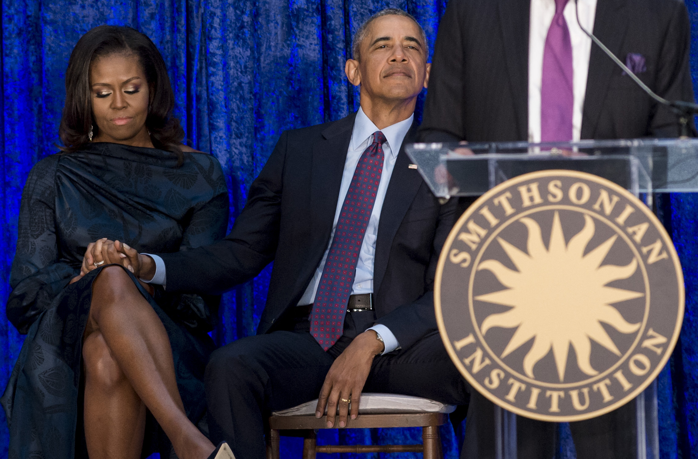 Michelle and Barack Obama at the unveiling of their portraits at the Smithsonian's National Portrait Gallery in Washington, D.C, February 12, 2018. | Source: Getty Images