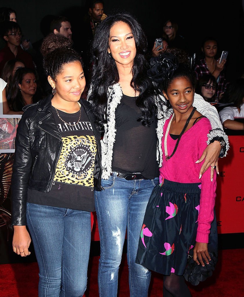 Kimora Lee Simmons and daughters attend the premiere of Lionsgate's "The Hunger Games: Catching Fire" at Nokia Theatre L.A. Live in Los Angeles, California | Photo: Getty Images