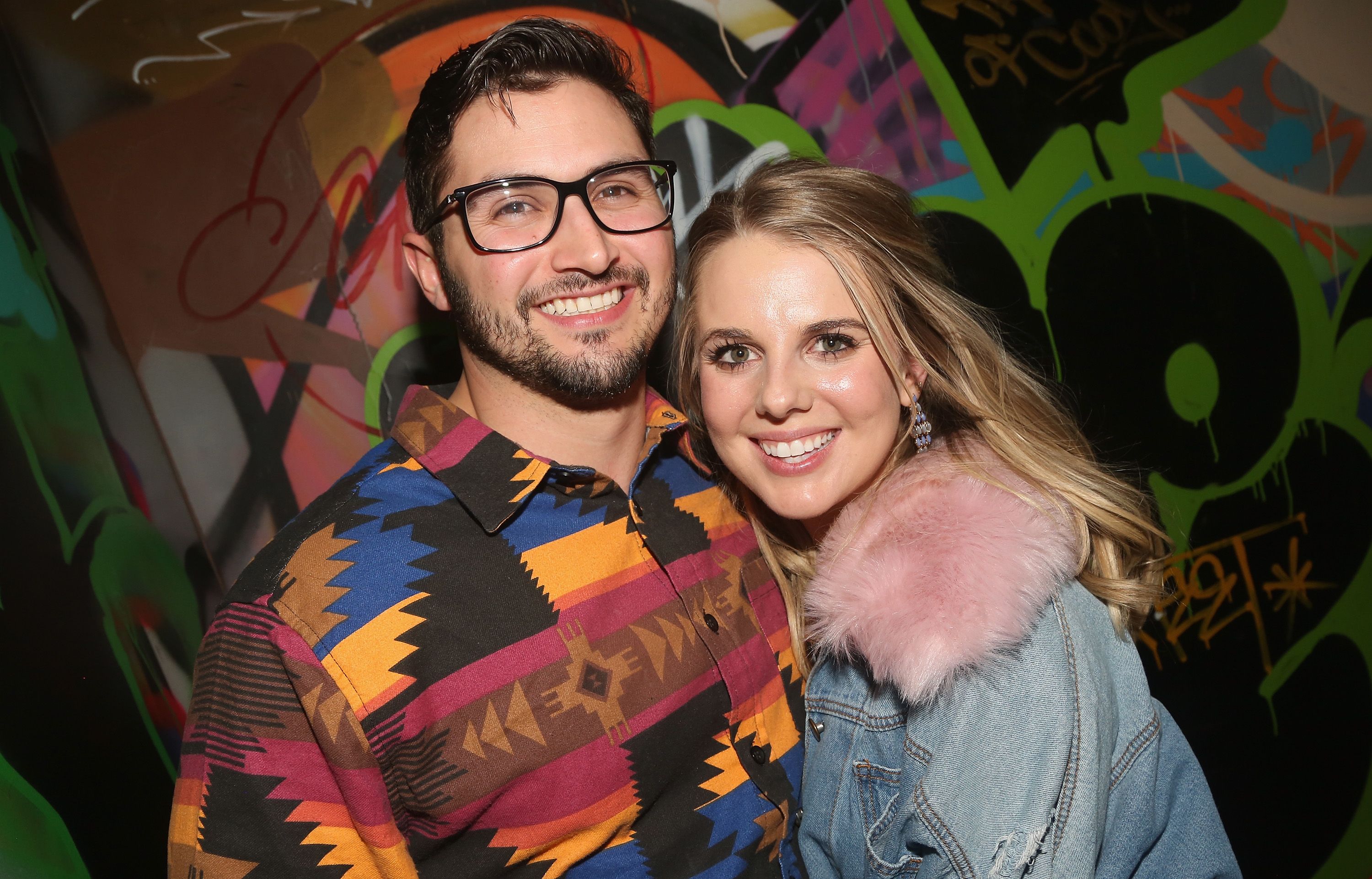 Nicole Franzel and fiance Victor Arroyo backstage at Frankie Grande's "Livin' La Vida Grande" in 2019 in New York City | Source: Getty Images