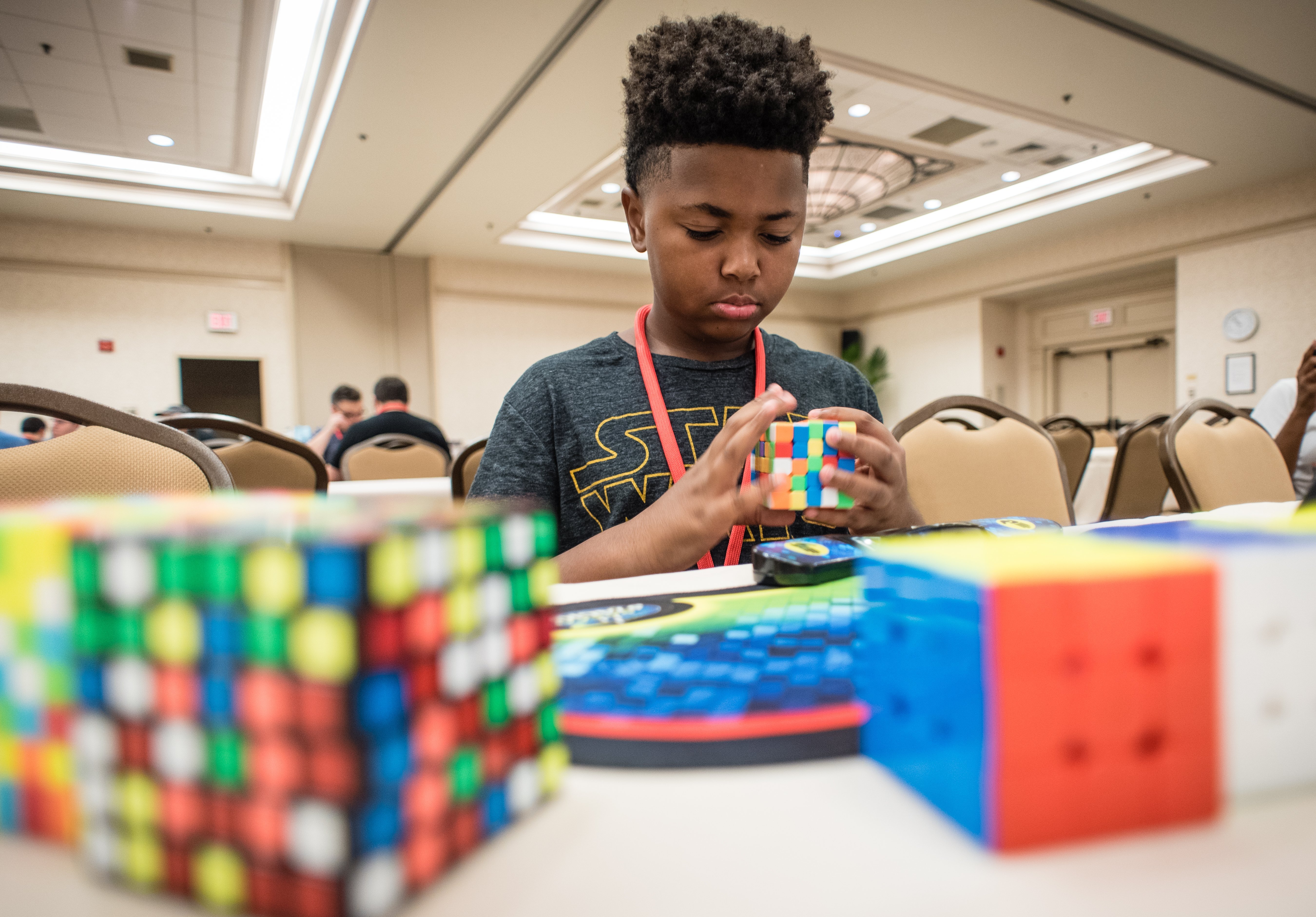  Stone Simpson, 11, from DC, came to demonstrate and teach people how to solve Rubik's Cubes and other twisty puzzles.|Photo: Getty Images