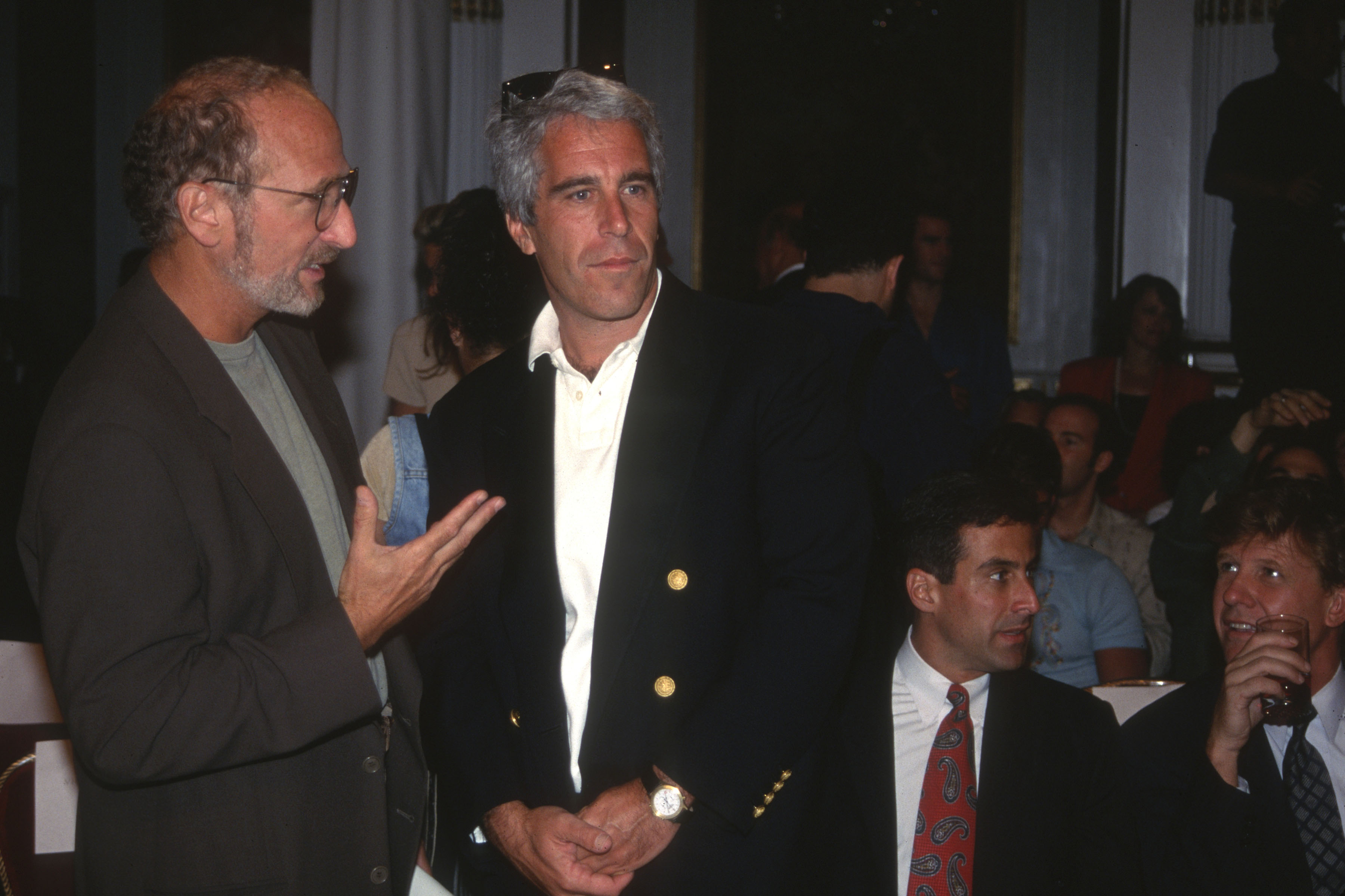 Jeffrey Epstein and a guest at the Victoria's Secret Fashion Show on August 1, 1995, in New York, United States. | Source: Getty Images