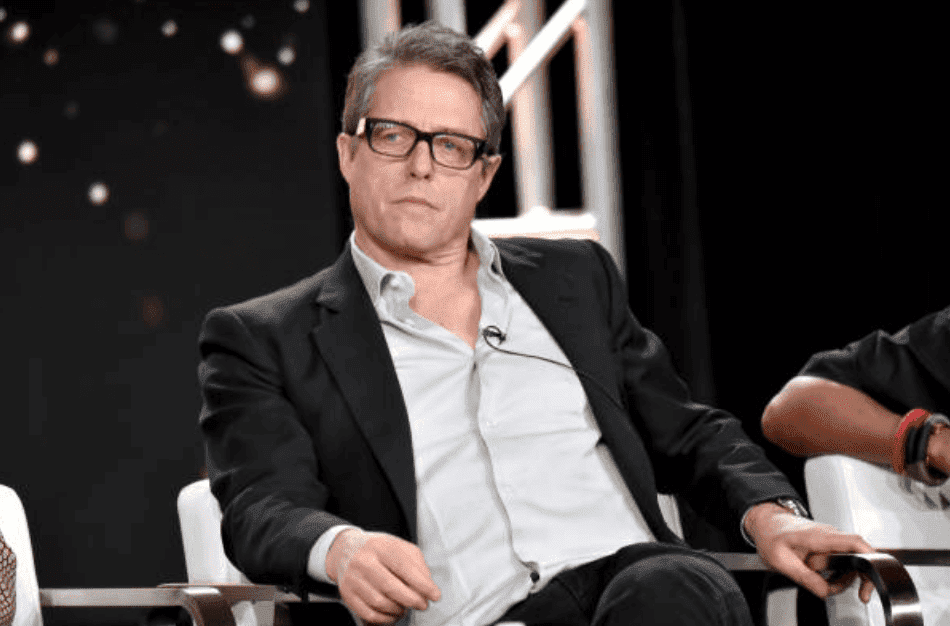 Hugh Grant sits onstage for a question and answer session during the Winter Television Critics Association Press Tour, on January 15, 2020, in Pasadena, California | Source: Jeff Kravitz/Getty Images for WarnerMedia