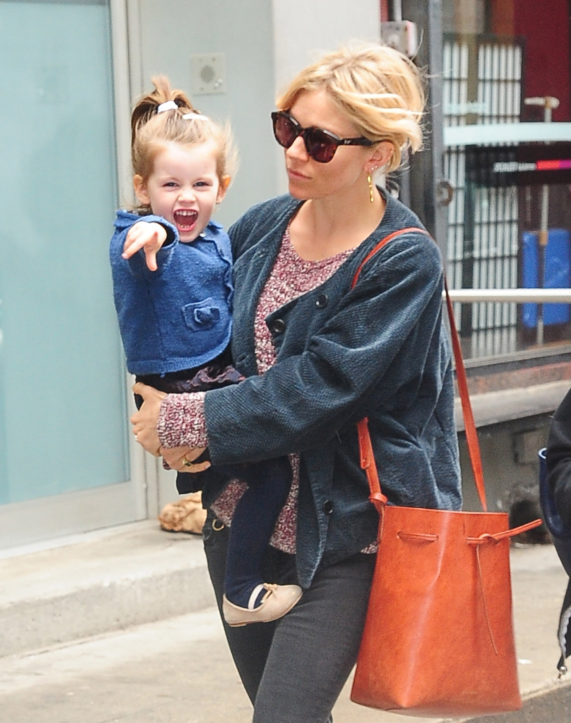 Sienna Miller and her daughter, Marlowe Sturridge, spotted out in Soho, New York City on June 3, 2015. | Source: Getty Images