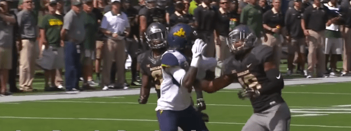 Chance Waz preventing a touchdown playing for Baylor University | Photo: YouTube/JustBombsProductions