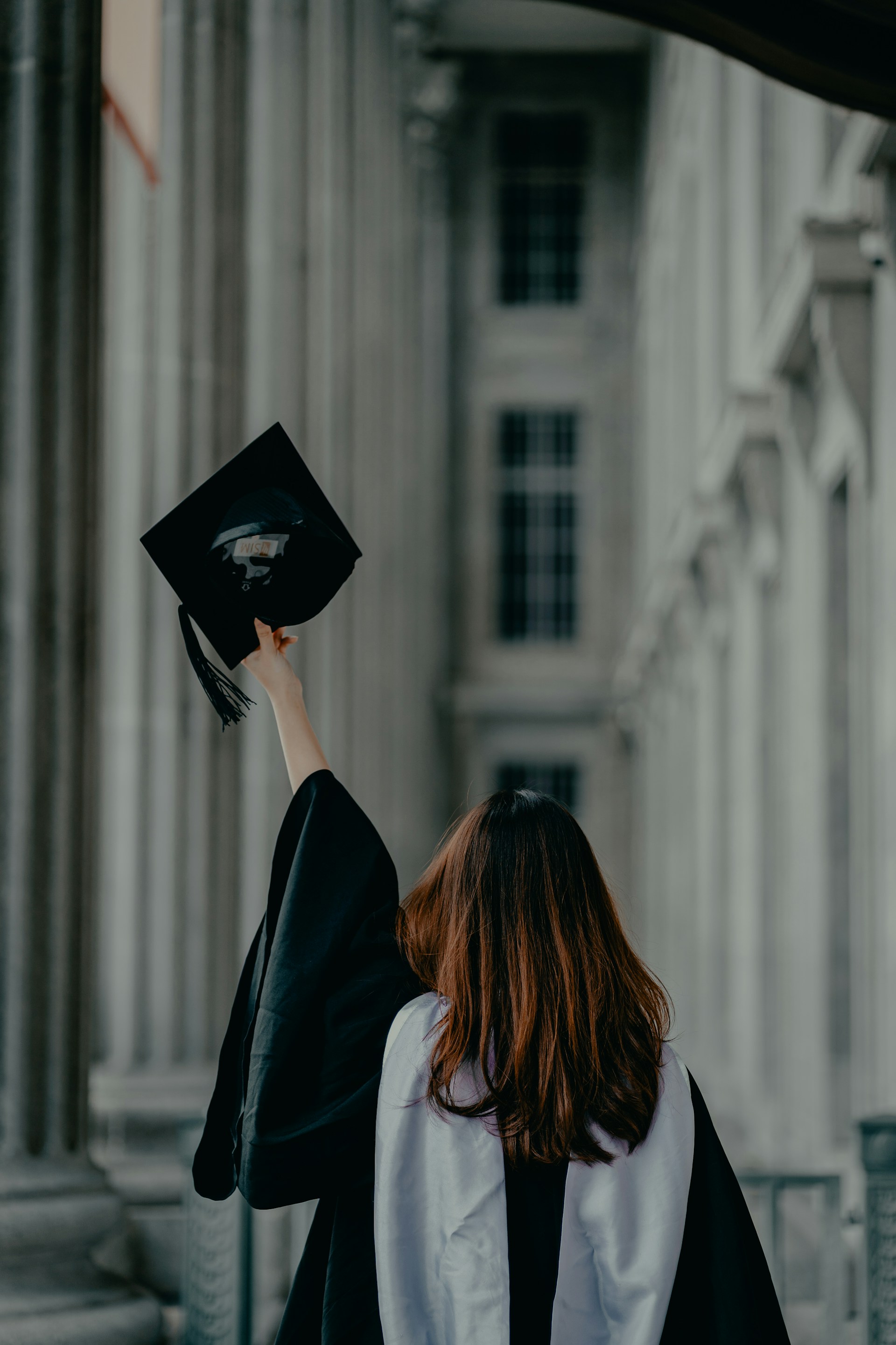 A woman at her graduation ceremony | Source: Unsplash