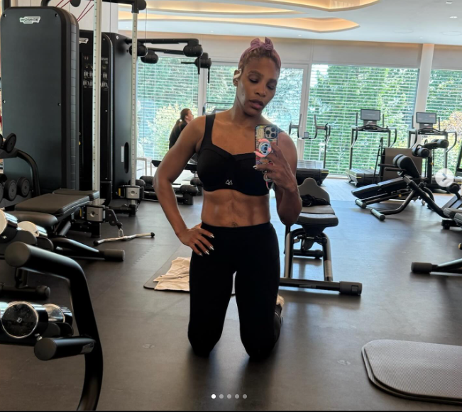 In the final snap, Serena Williams posed with one knee slightly bent, hand on her hip, and her phone lifted for the shot. Her outfit and surroundings remained the same, offering one last look at her strong form and fitness progress.